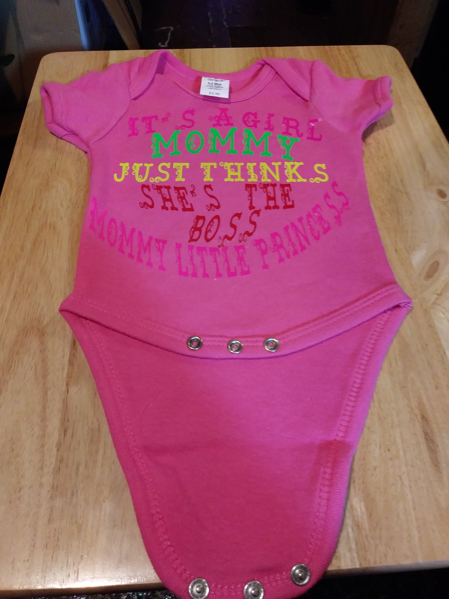 Size 0-3 months 100% cotton Pink Mommy just thinks she's the boss oneies