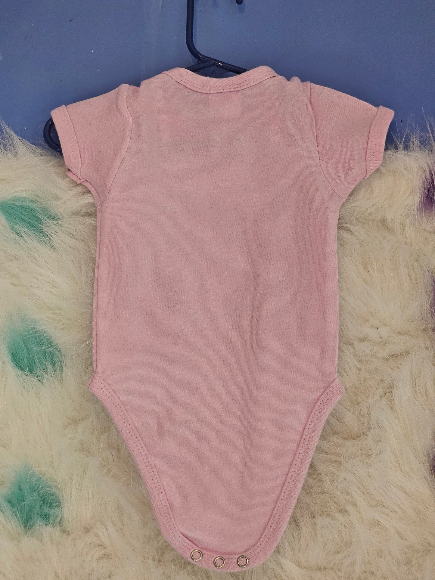 Size 0-3 months 100% cotton Pink Personalized baby girl's Oneies with the letter D and name in the middle.