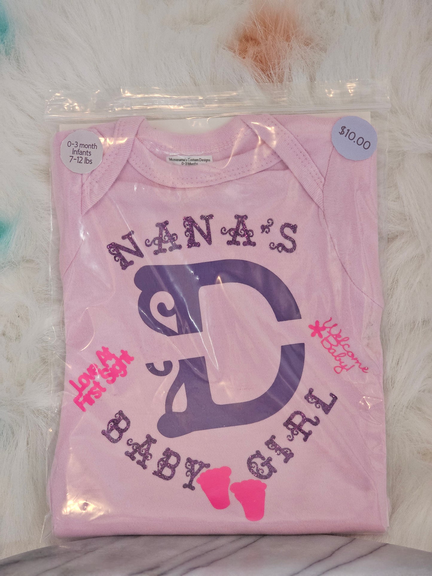 Size 0-3 months 100% cotton Pink Personalized baby girl's Oneies with the letter D and name in the middle.