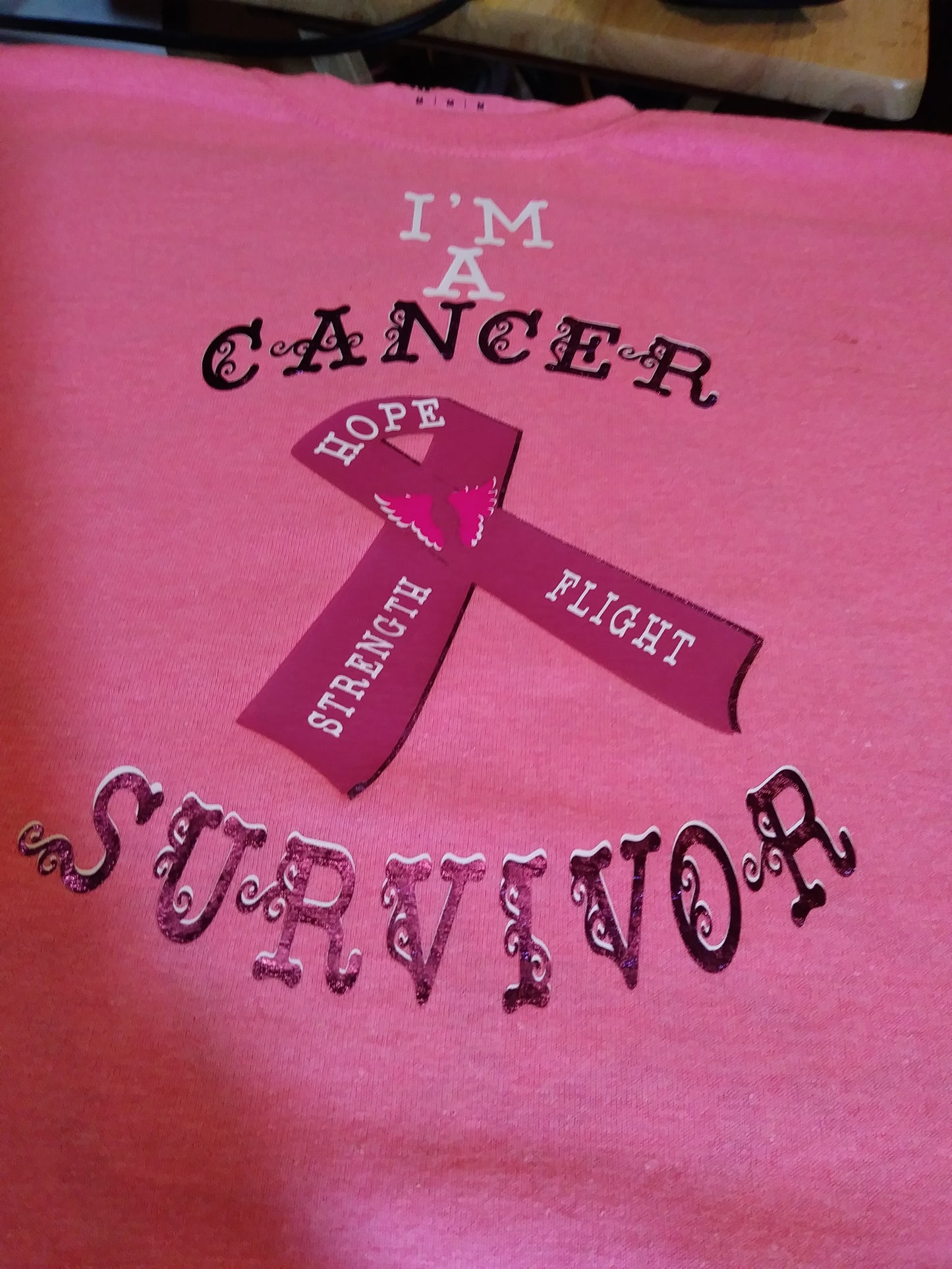 Size M 50% cotton 50% polyester Pink 'm a cancer survivor shirt