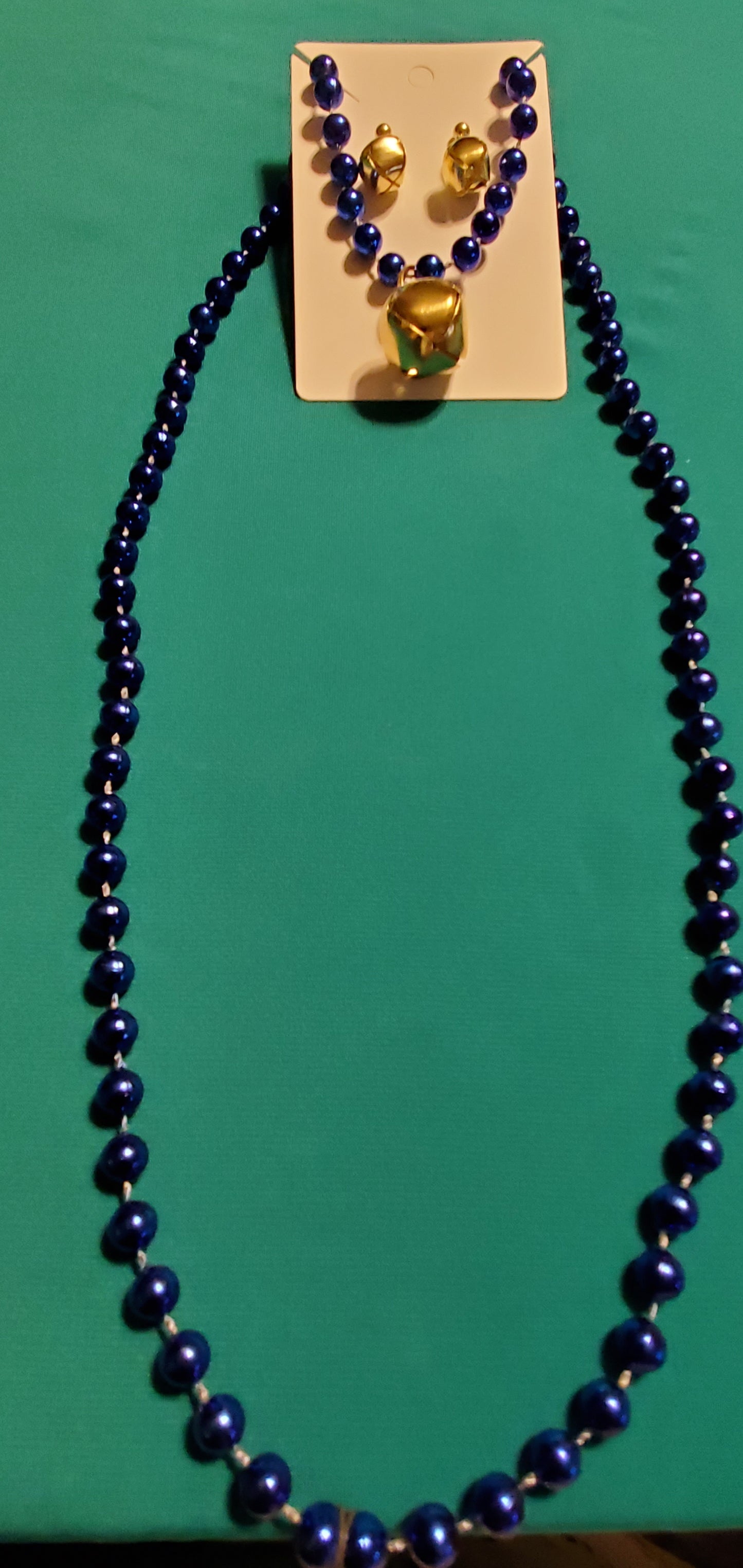 Christmas bells on blue beaded necklace and earrings