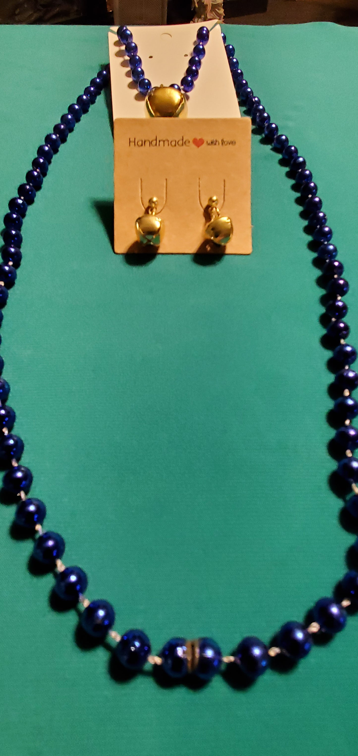 Christmas bells on blue beaded necklace and earrings