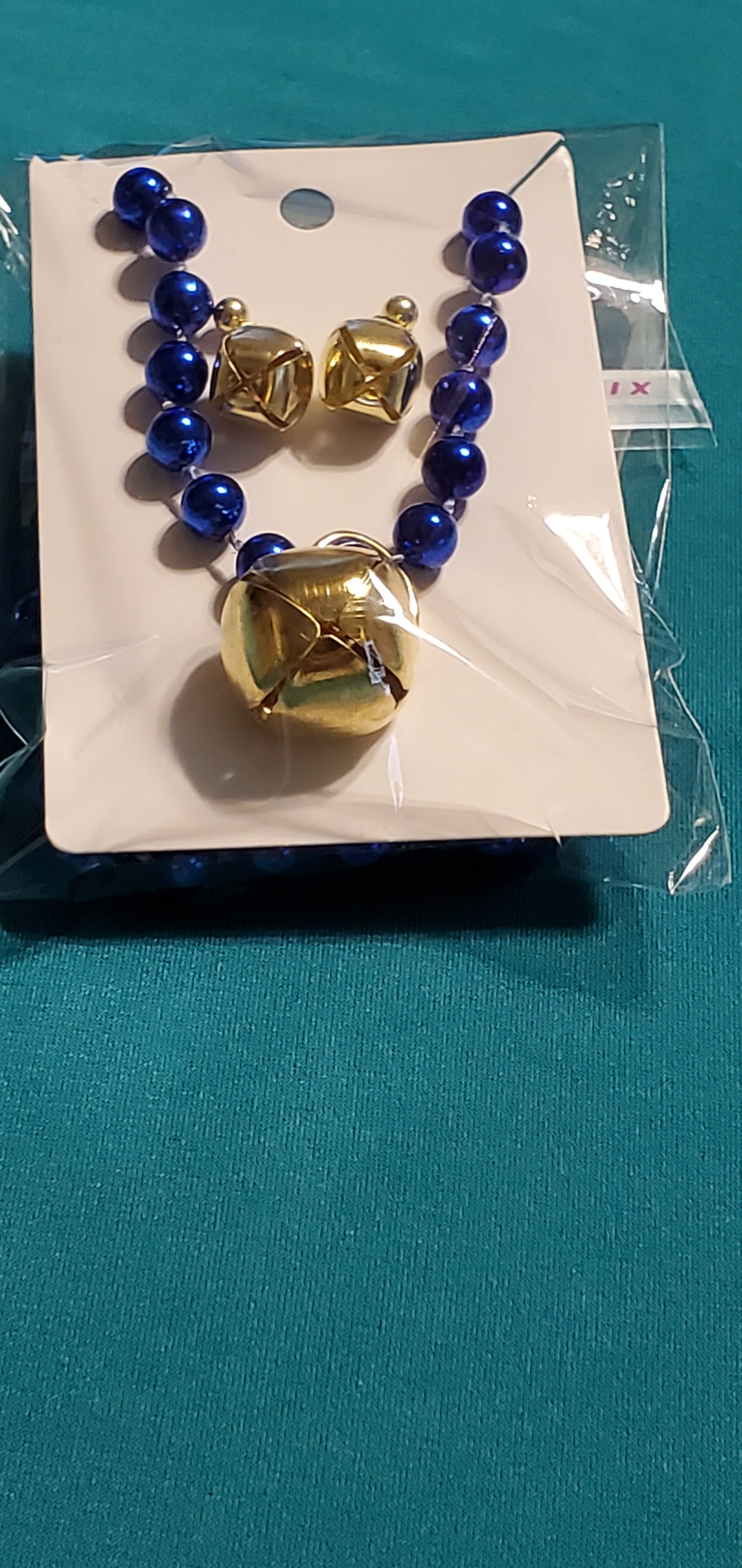 Christmas bells on blue beaded necklace and earrings