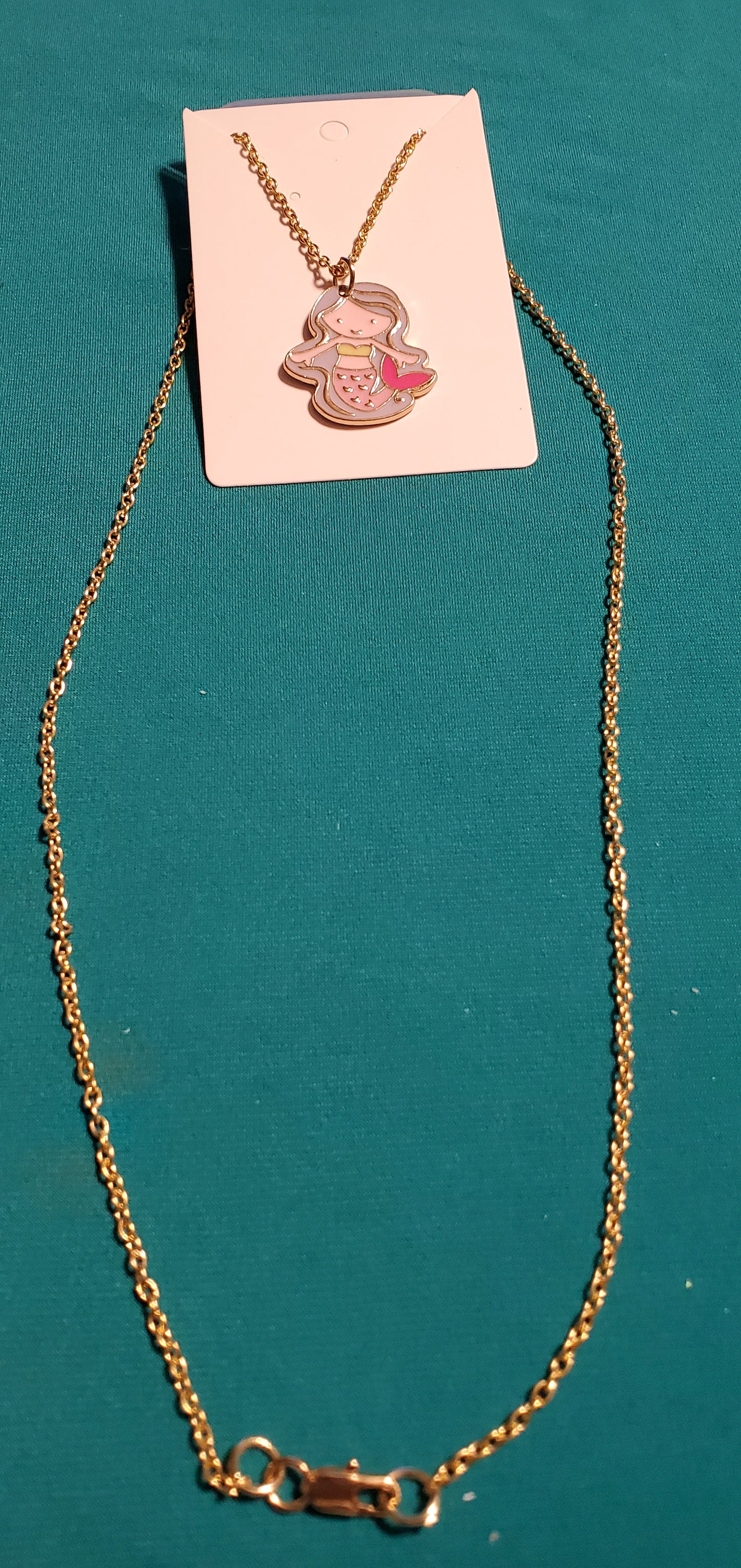 Little girl mermaid on gold plated necklace