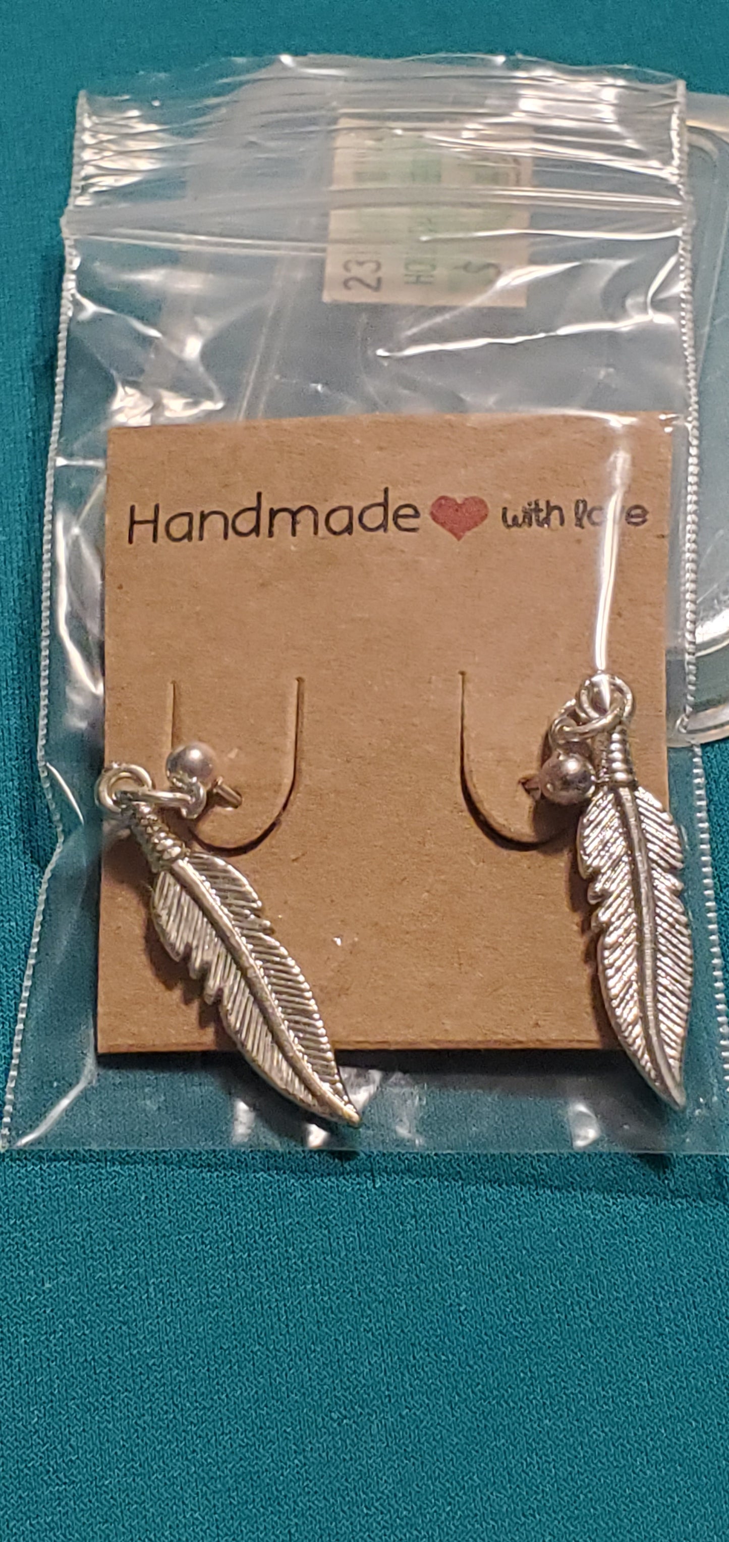 Stainless steel silver plated feather post earrings