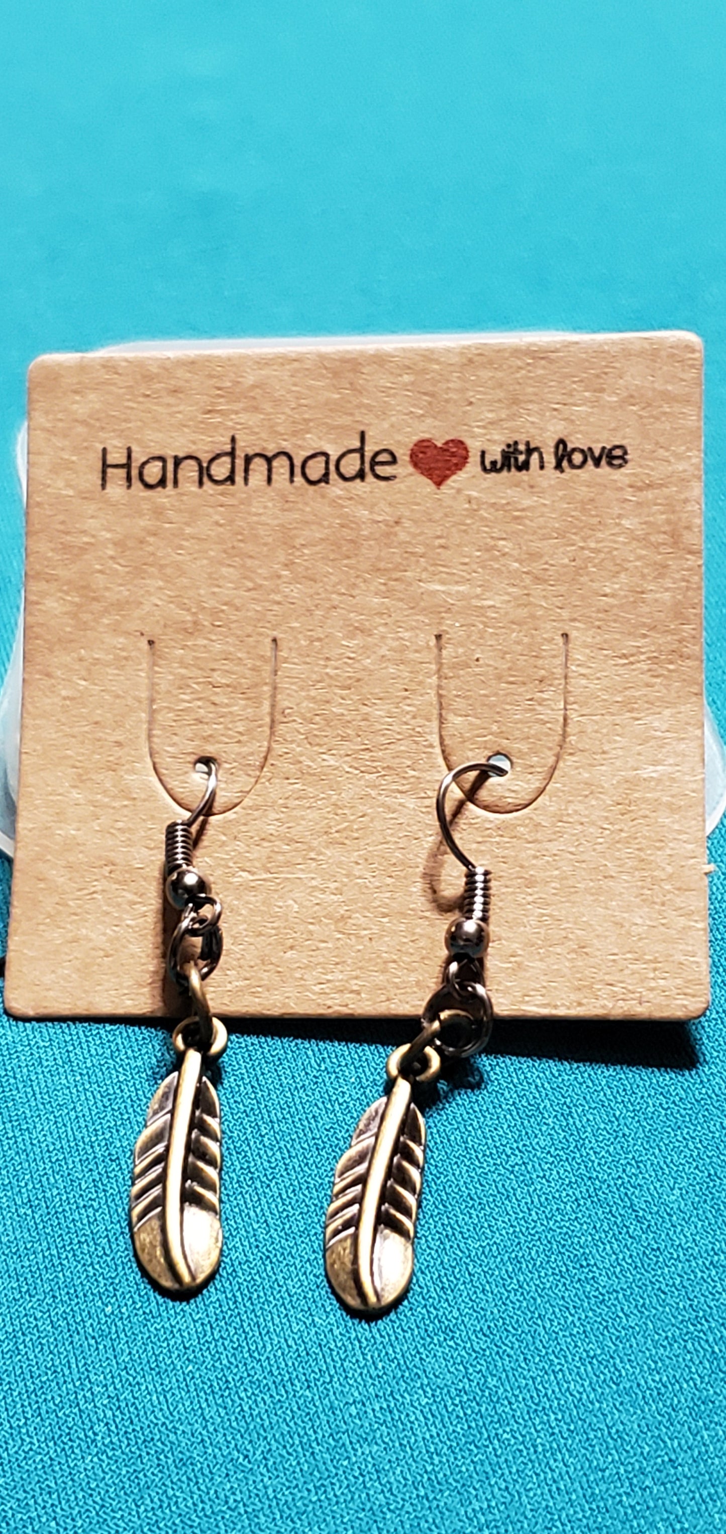 Bronze plated feather earrings