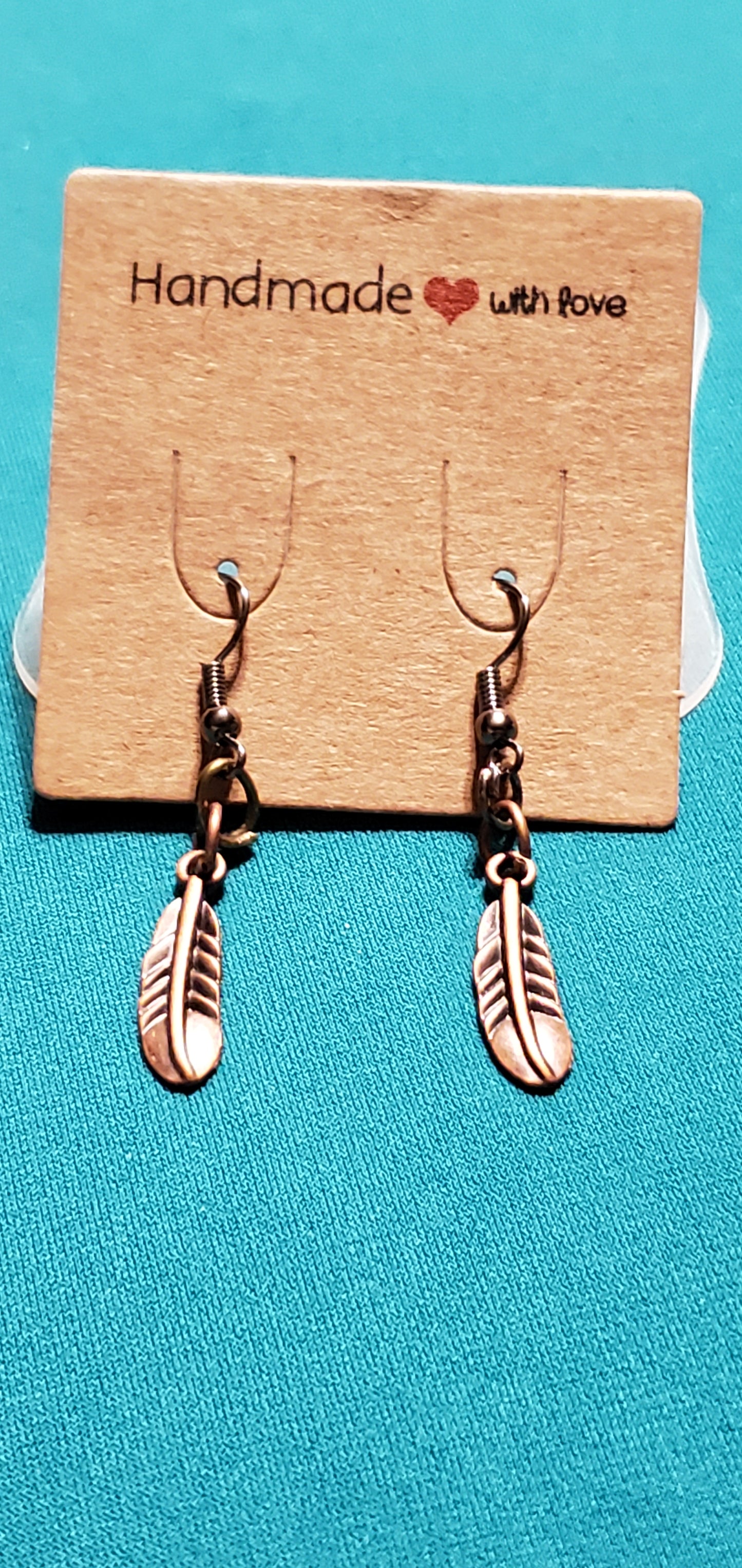 Bronze plated feather earrings