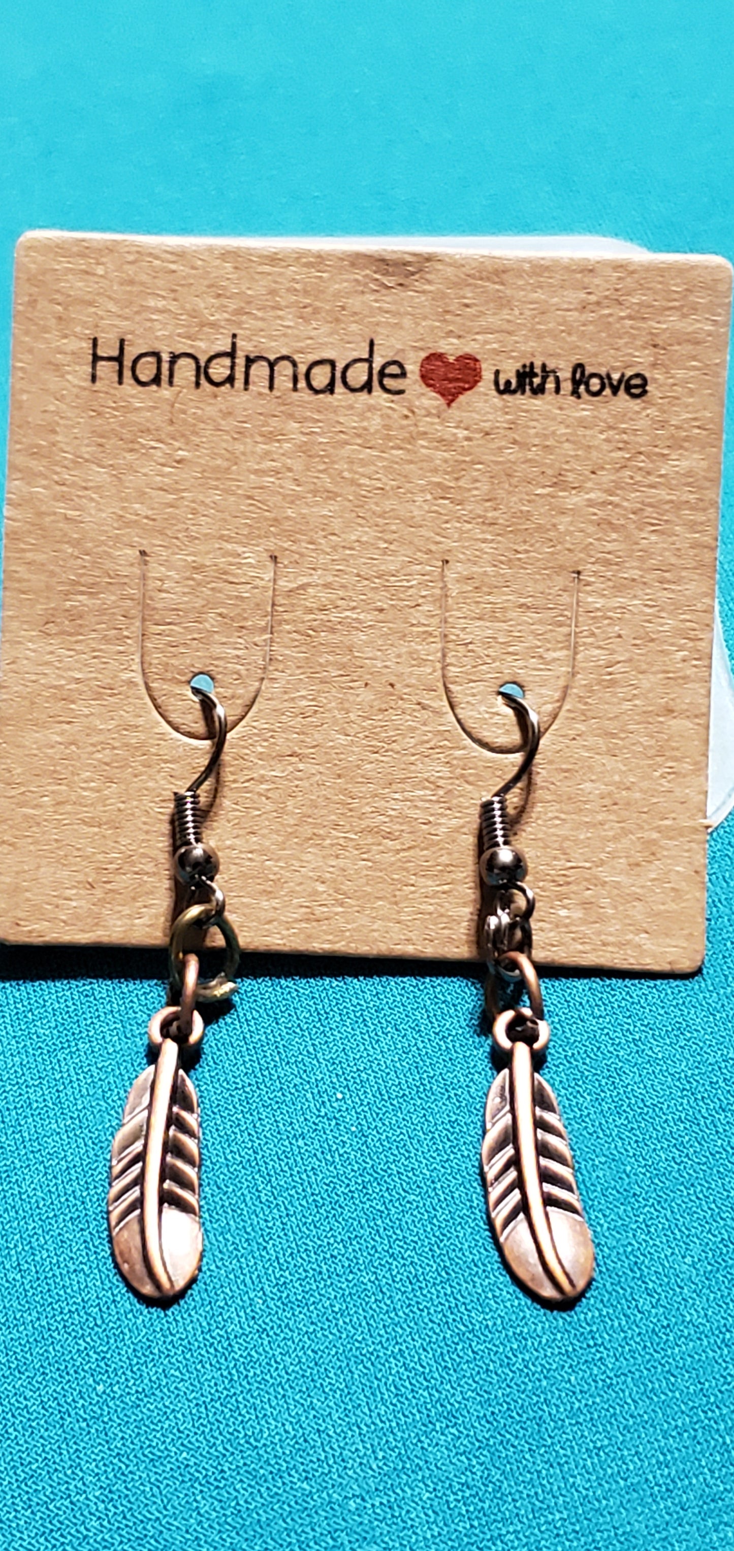 Bronze plated feather earrings