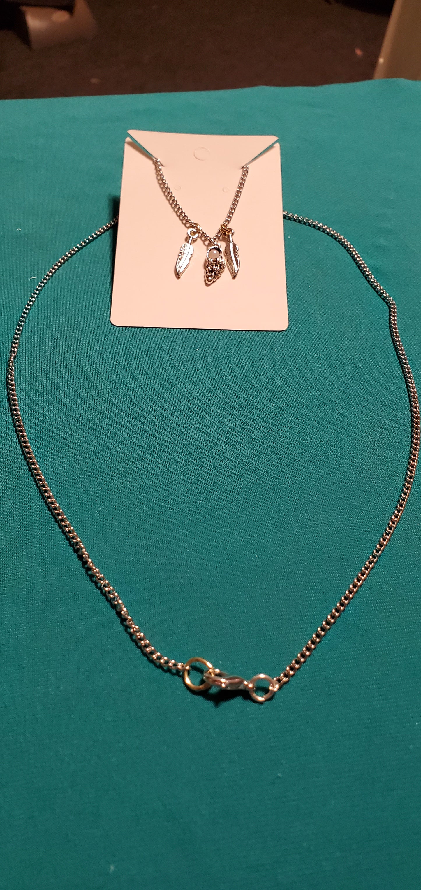 Stainless steel silver plated angel wings with feathers necklace and angel earrings