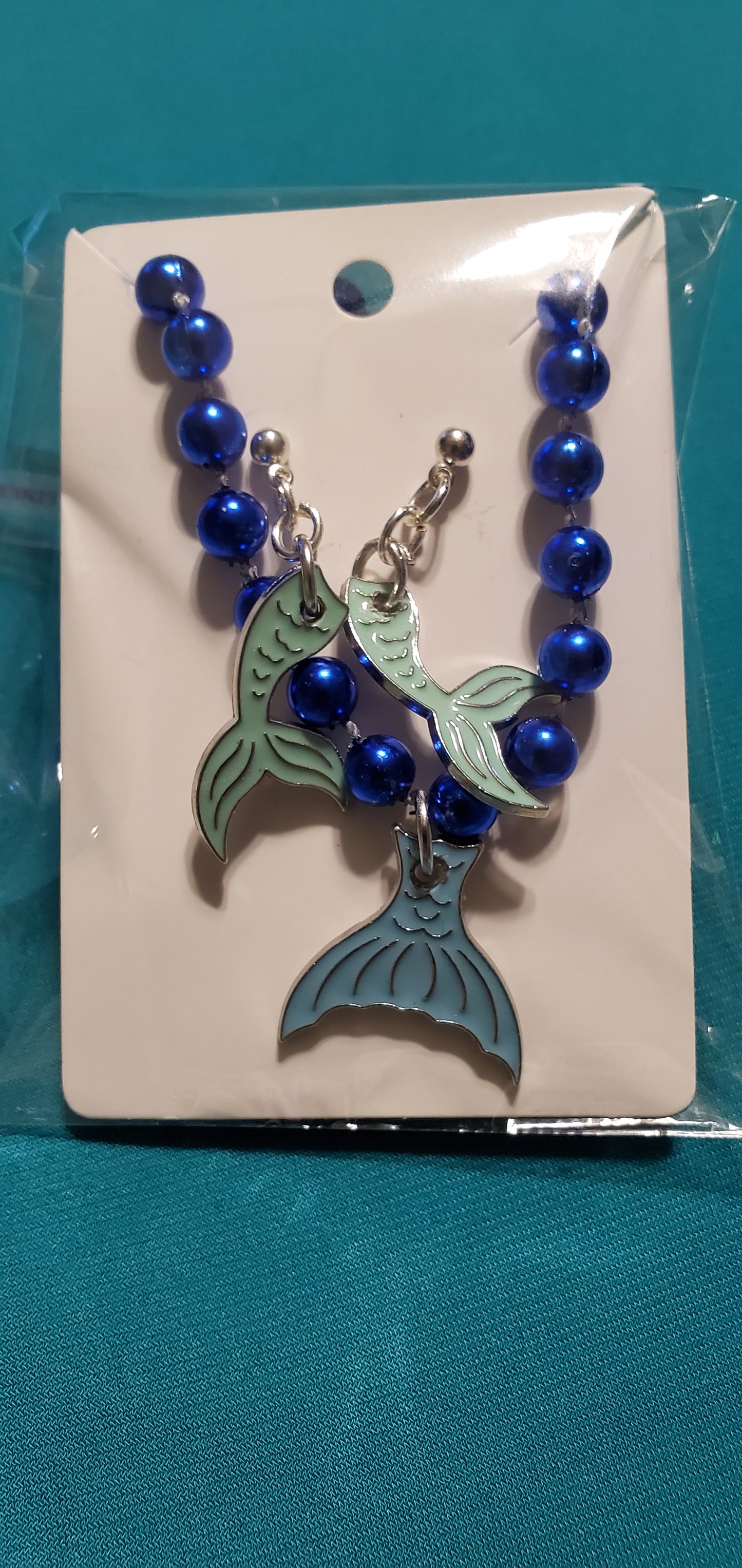 Mermaid tail on blue beaded necklace & earrings
