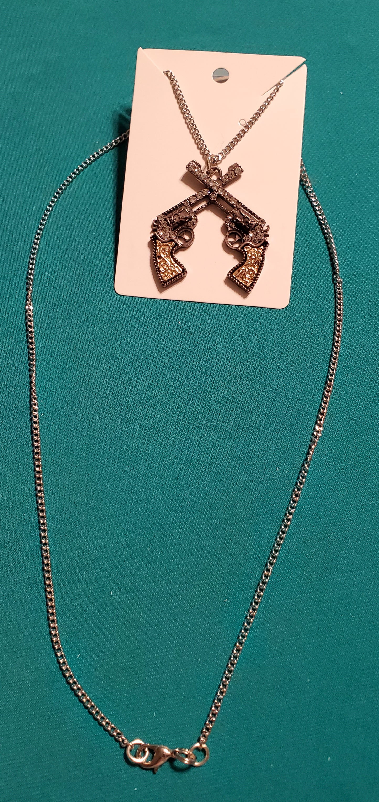 Cowgirl's guns and boots necklace and earrings