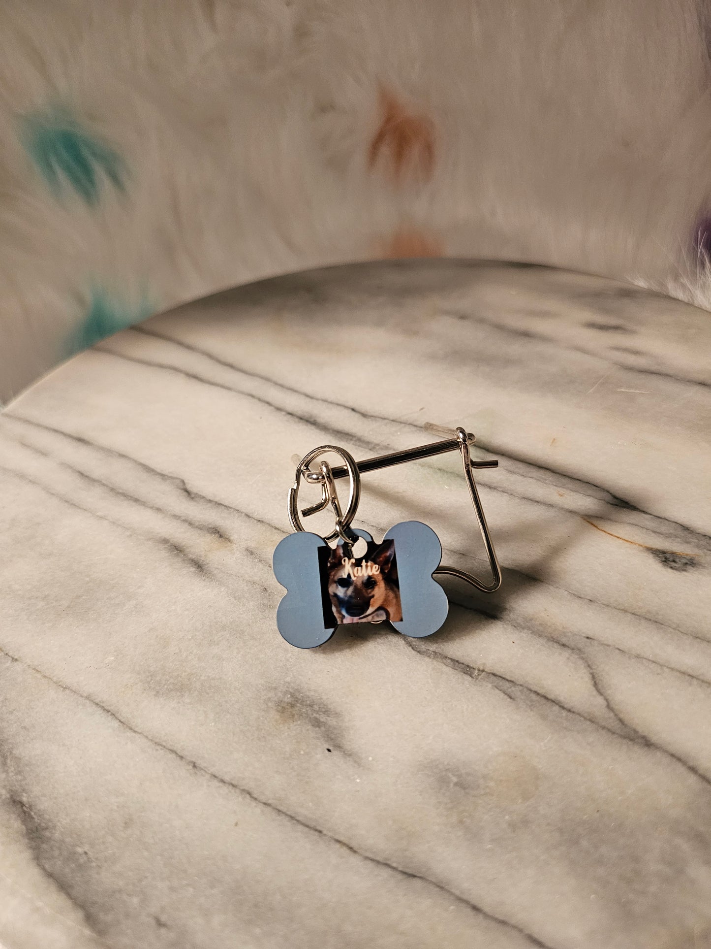 Small Dog tag with your dog picture on front and the owner's name and phone number on back