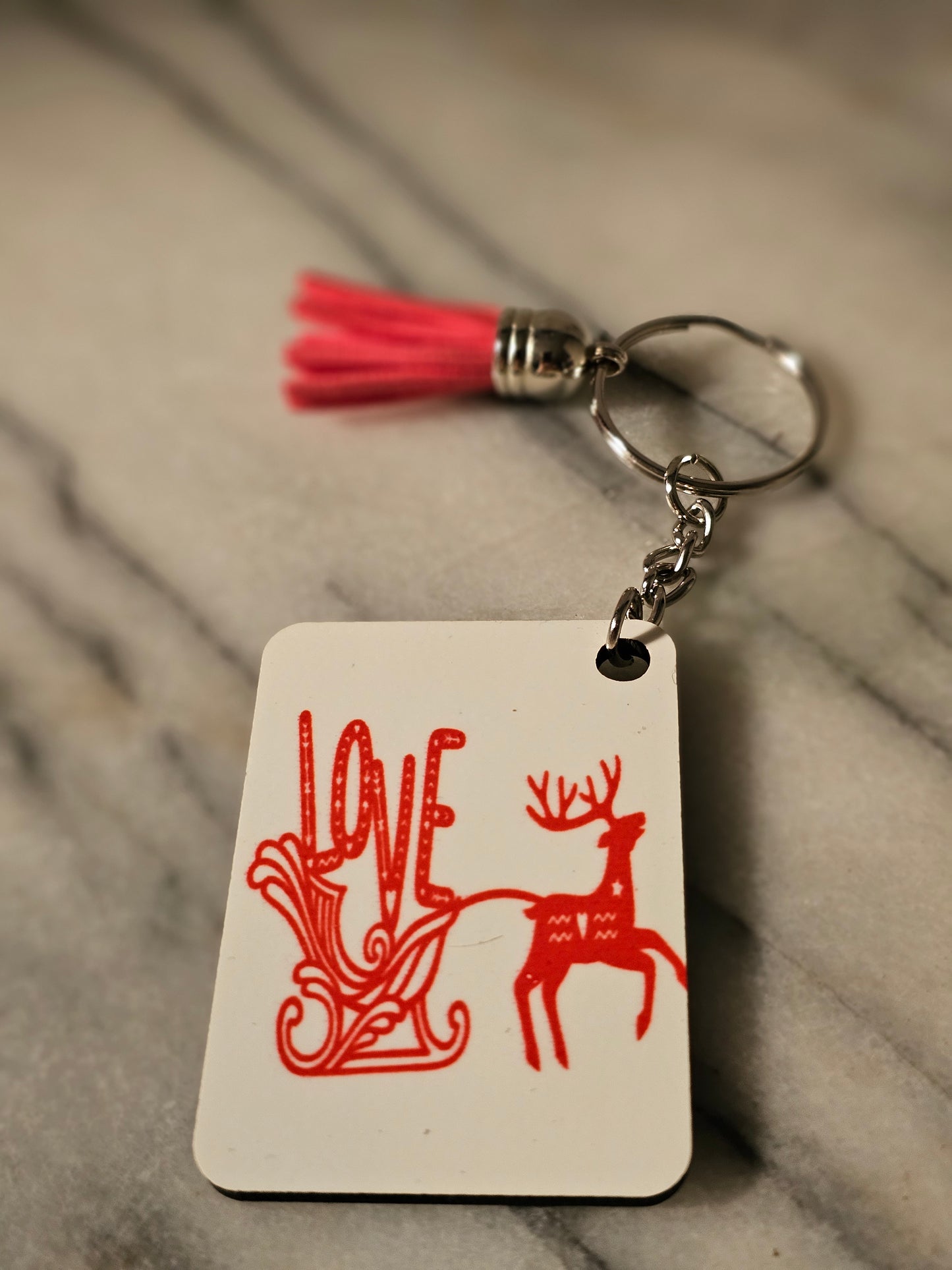 Sublimation rectangle Rudolph and slide Christmas Keychain.