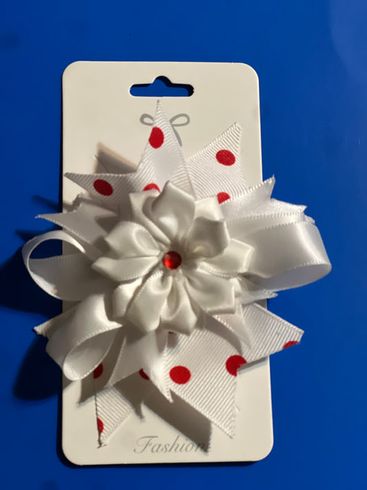 White flowery with red dots hair bow