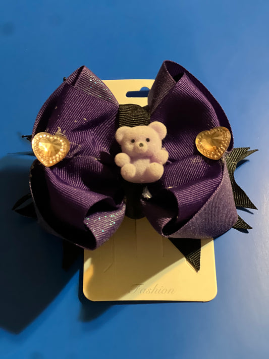 Purple hair bow with teddy bear