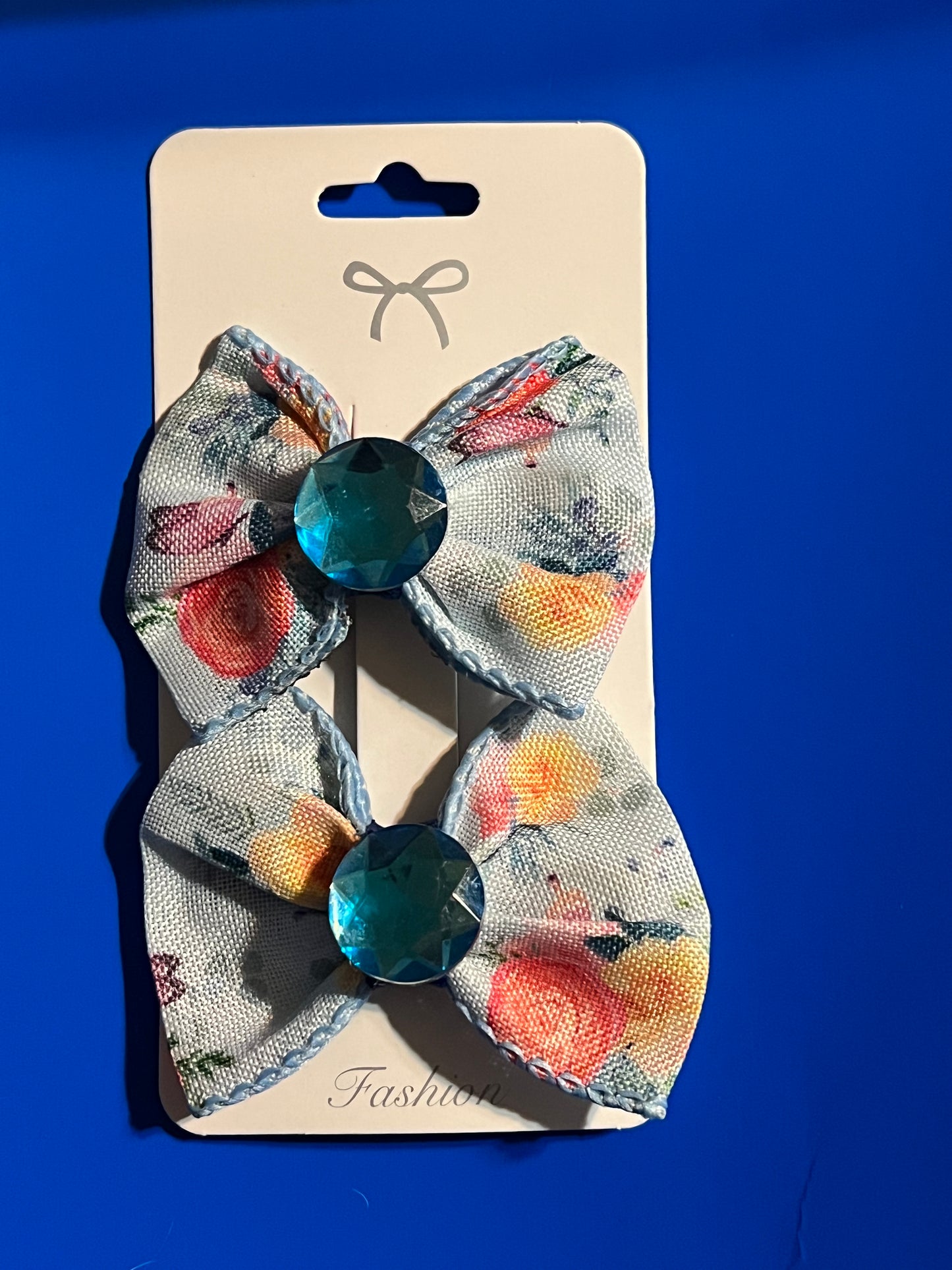 2 little girls blue hair bows