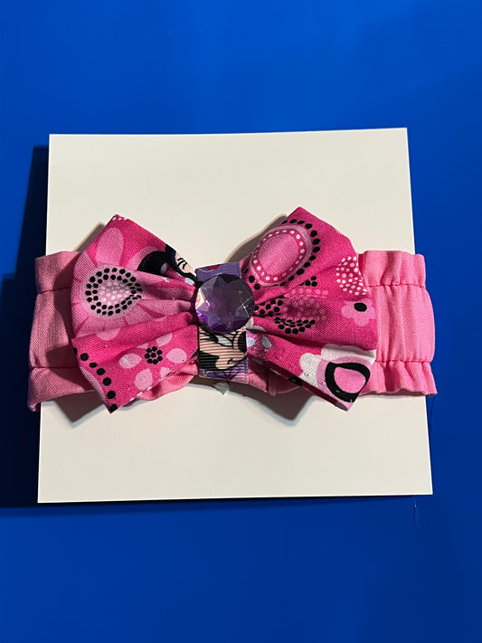 Mickey Mouse with purple gemstone hair bow