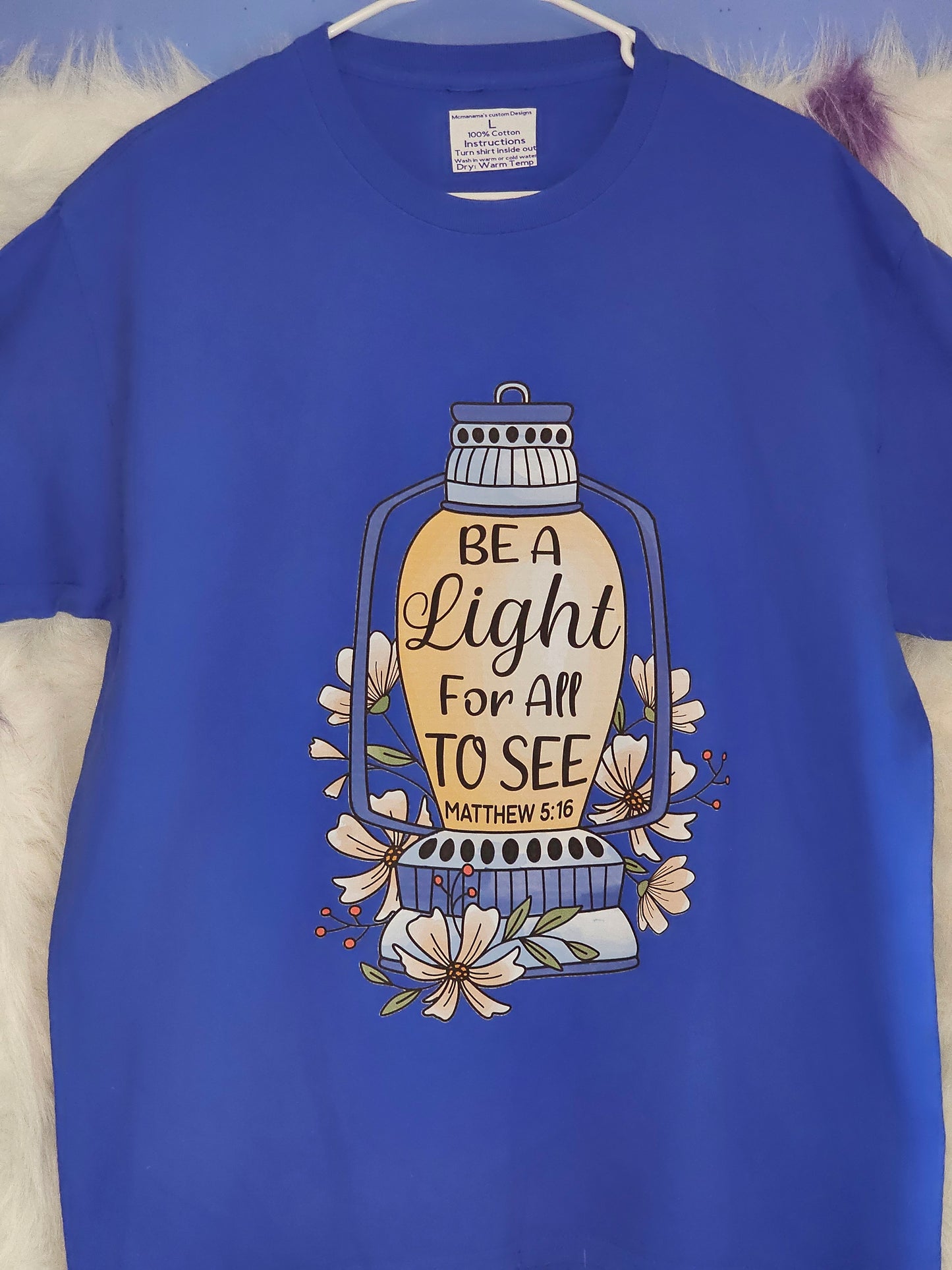 Size L 100% cotton blue Be a light for all to see Tshirt