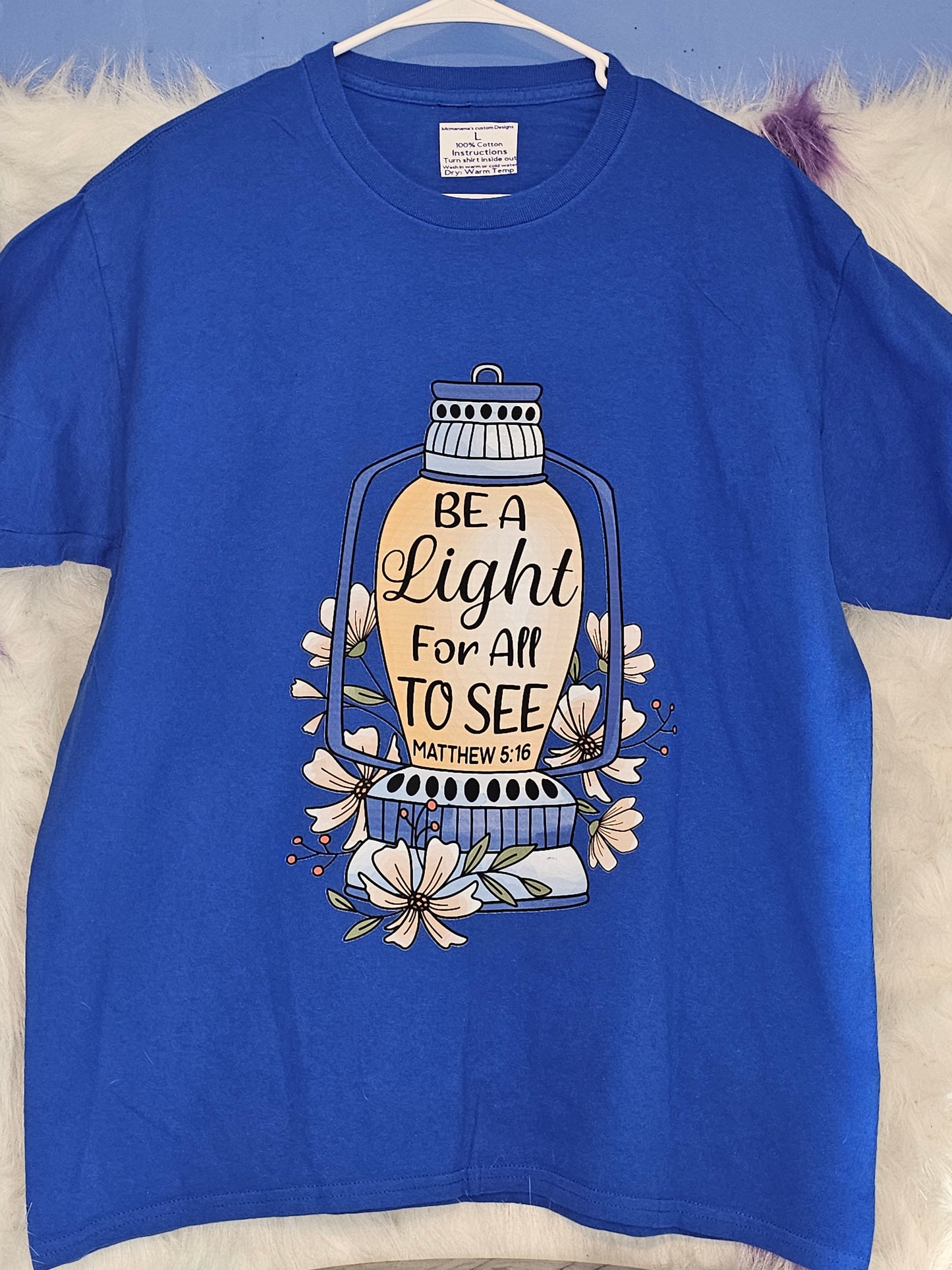 Size L 100% cotton blue Be a light for all to see Tshirt