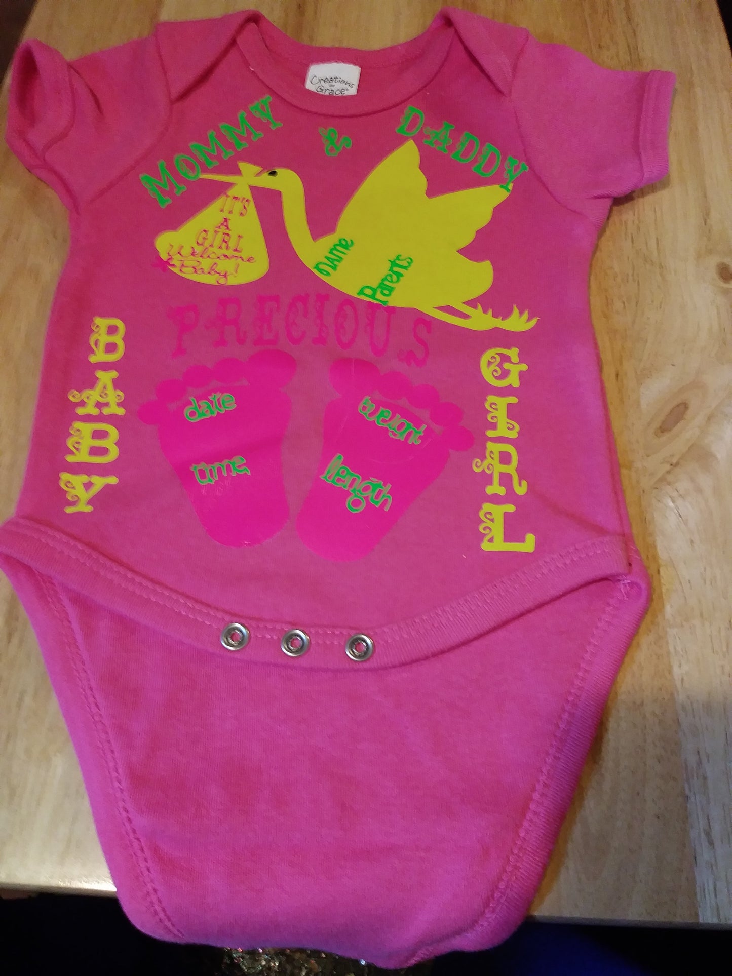 Size 0-3 months 100% cotton Pink Mommy and Daddy's baby girl oneies