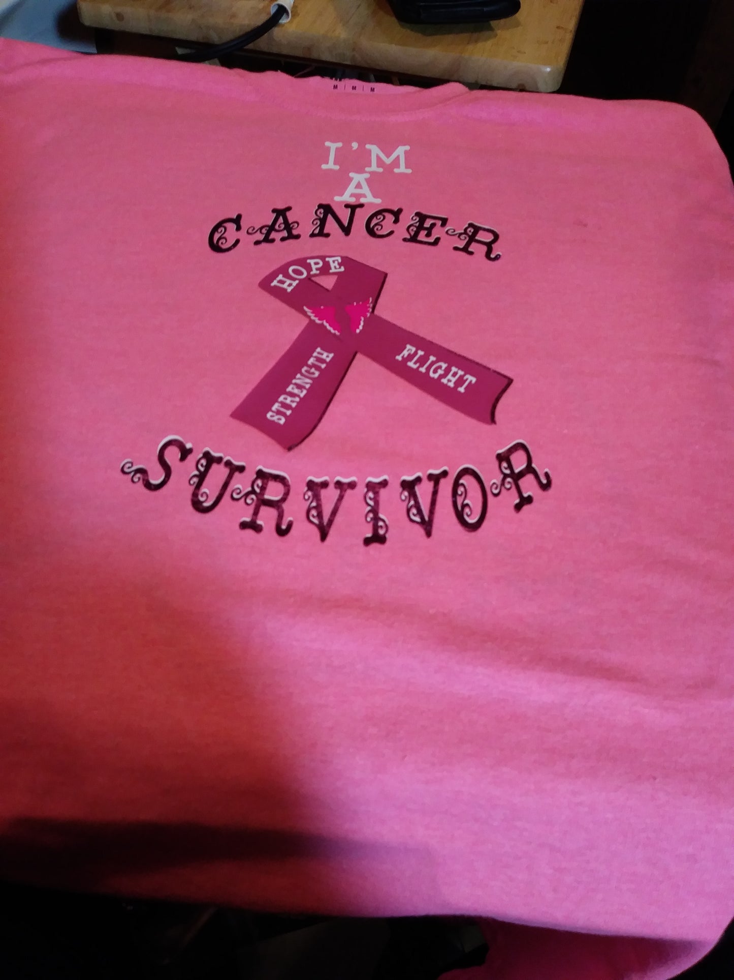 Size M 50% cotton 50% polyester Pink 'm a cancer survivor shirt