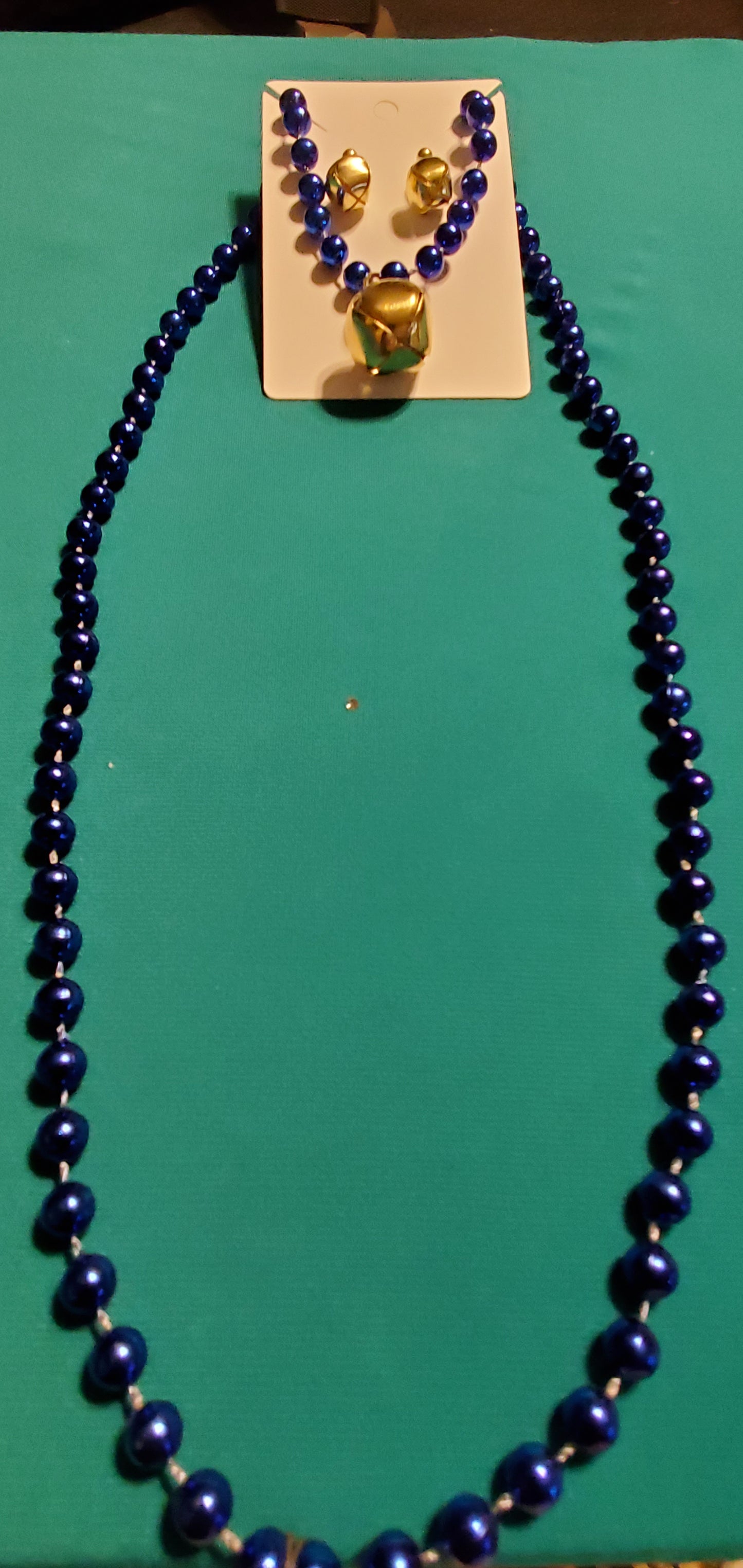 Christmas bells on blue beaded necklace and earrings