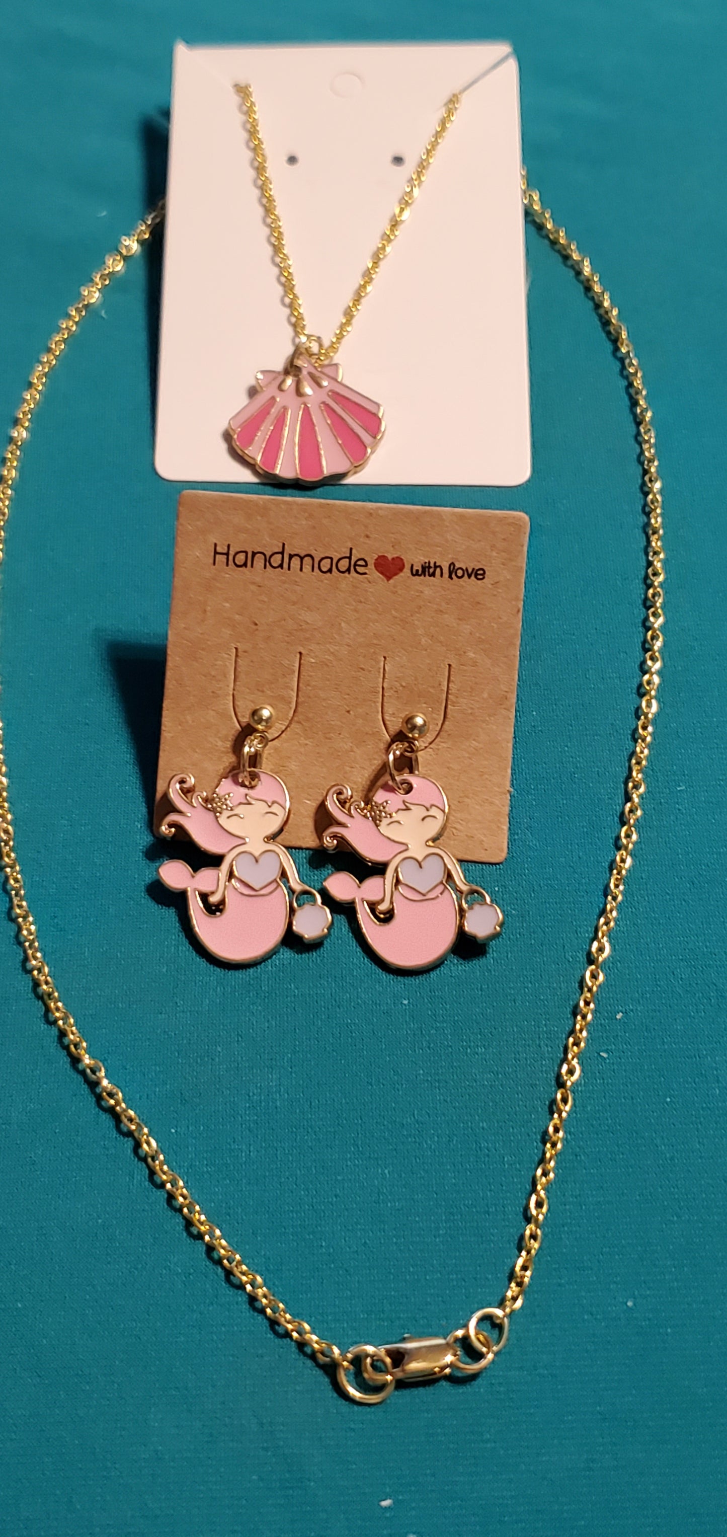 Gold plated pink mermaid earrings and pink sea shell