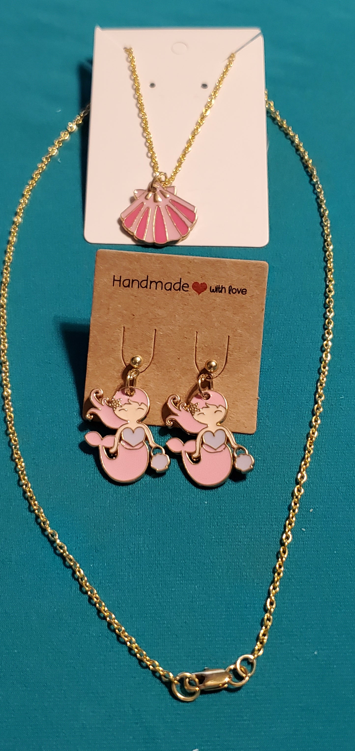Gold plated pink mermaid earrings and pink sea shell