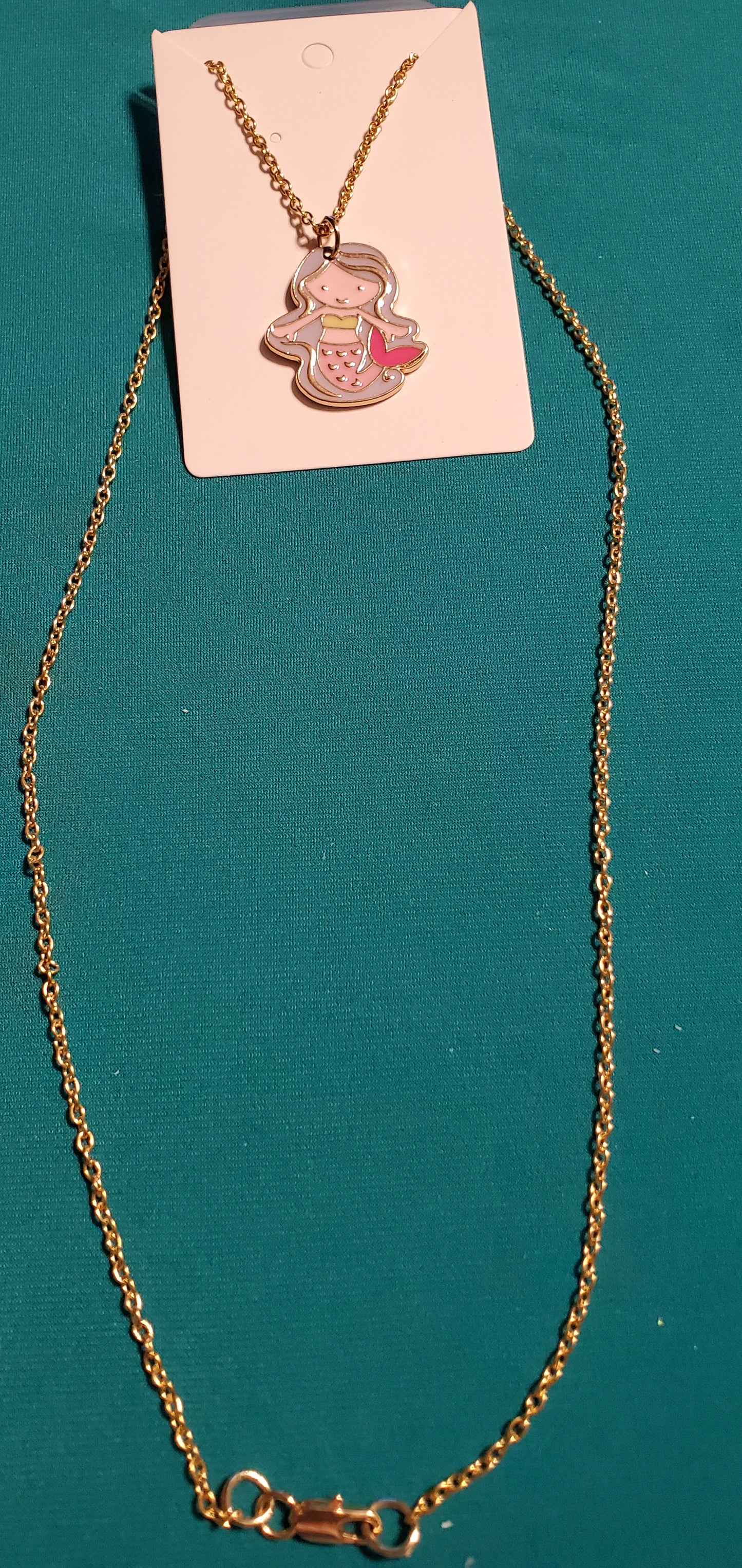 Little girl mermaid on gold plated necklace