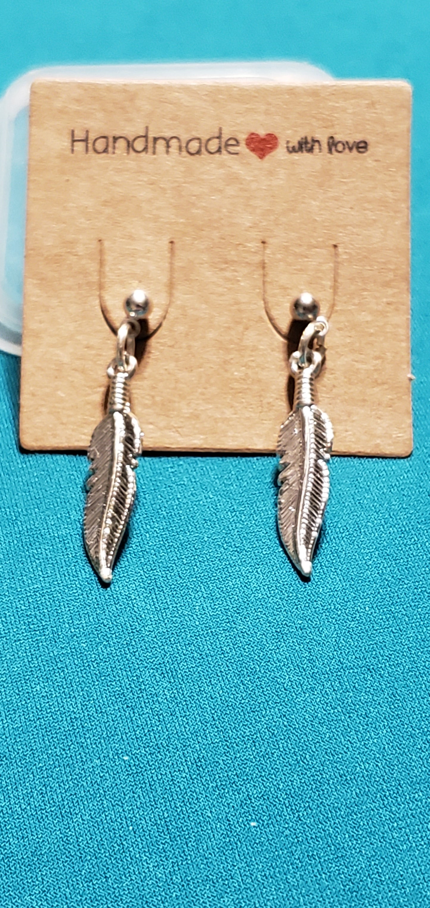 Stainless steel silver plated feather post earrings