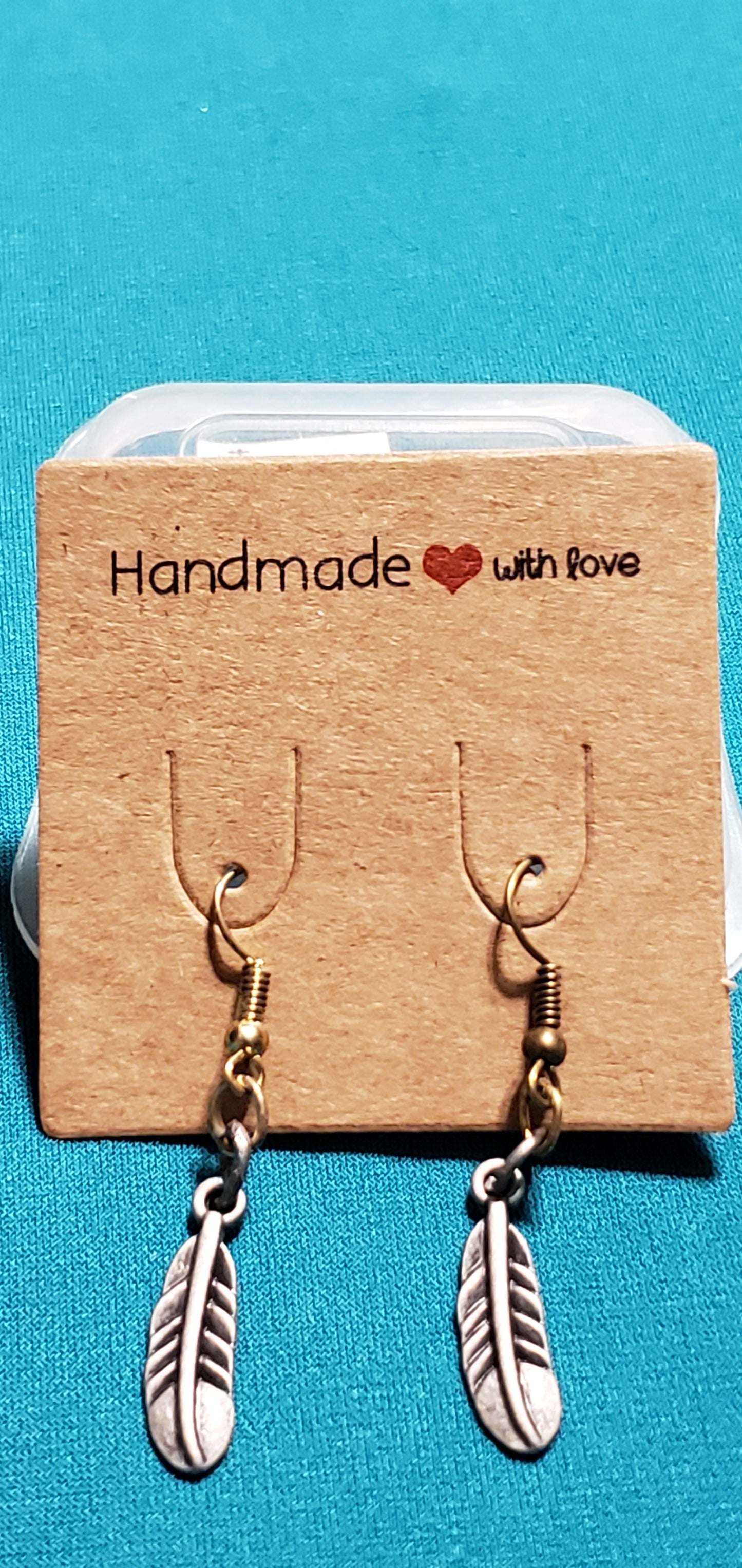 Bronze plated feather earrings