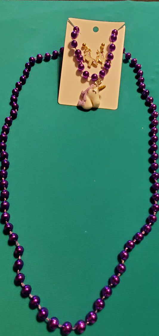 Purple and white unicorn on purple beaded necklace