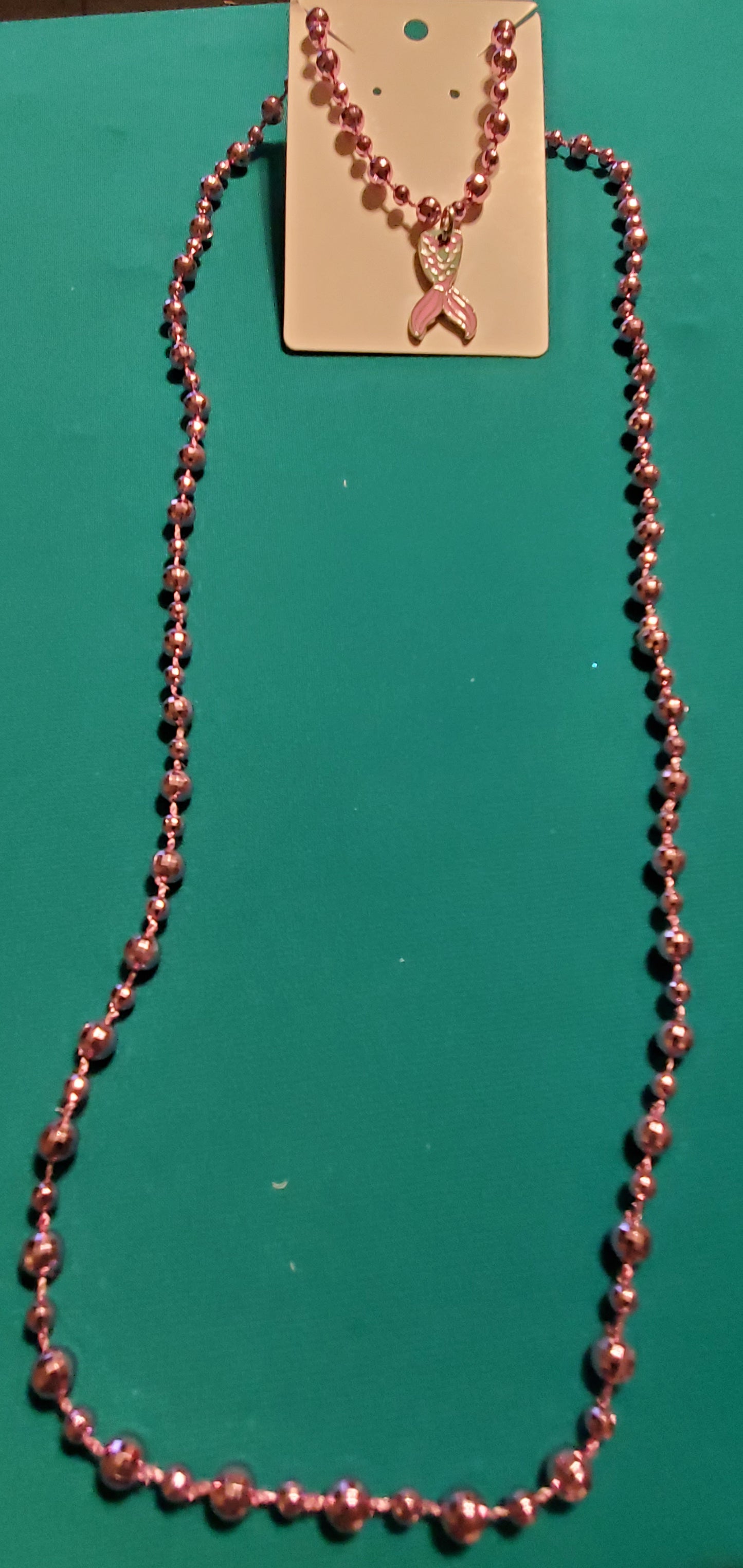 Pink mermaid tail on pink beaded necklace