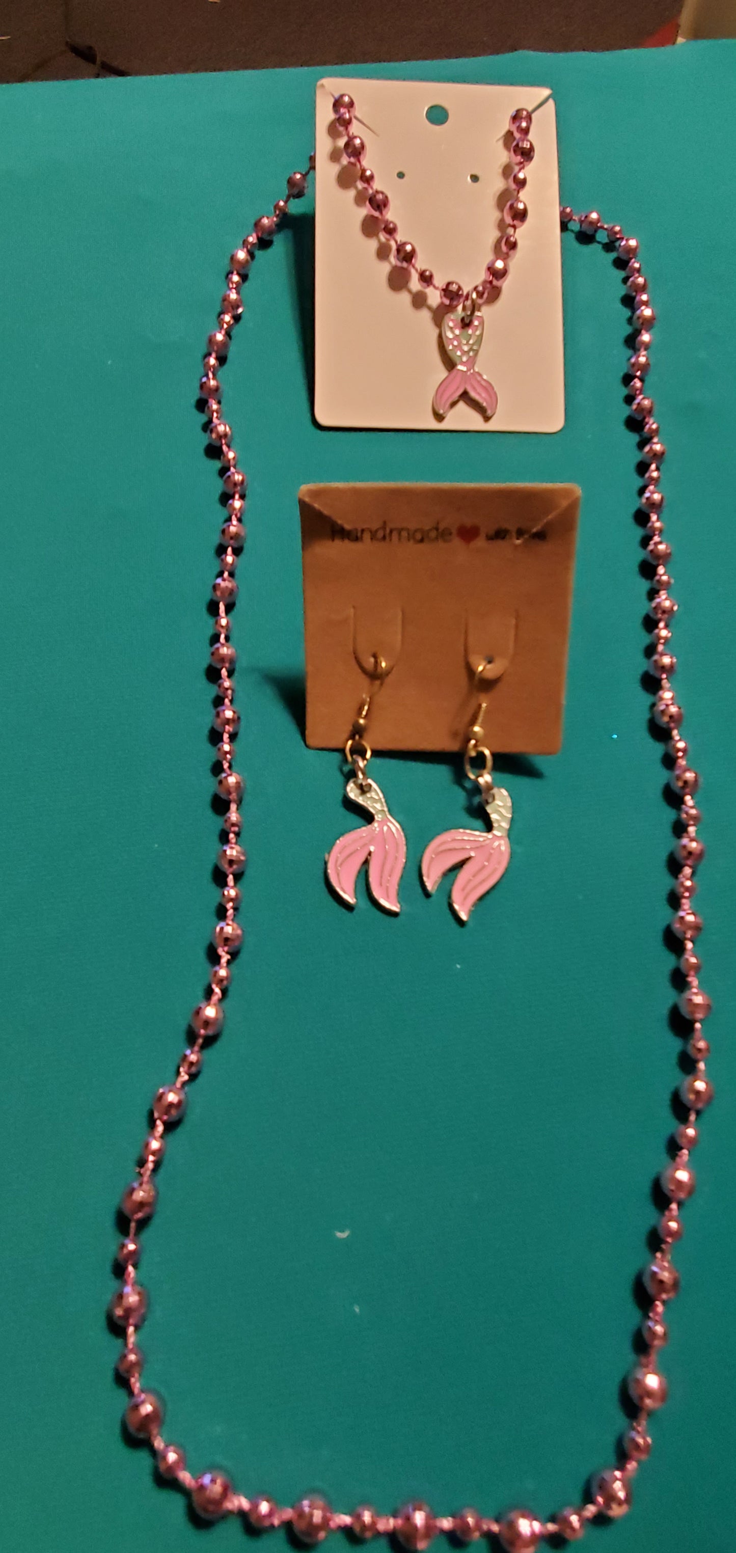 Pink mermaid tail necklace and earrings on pink beads