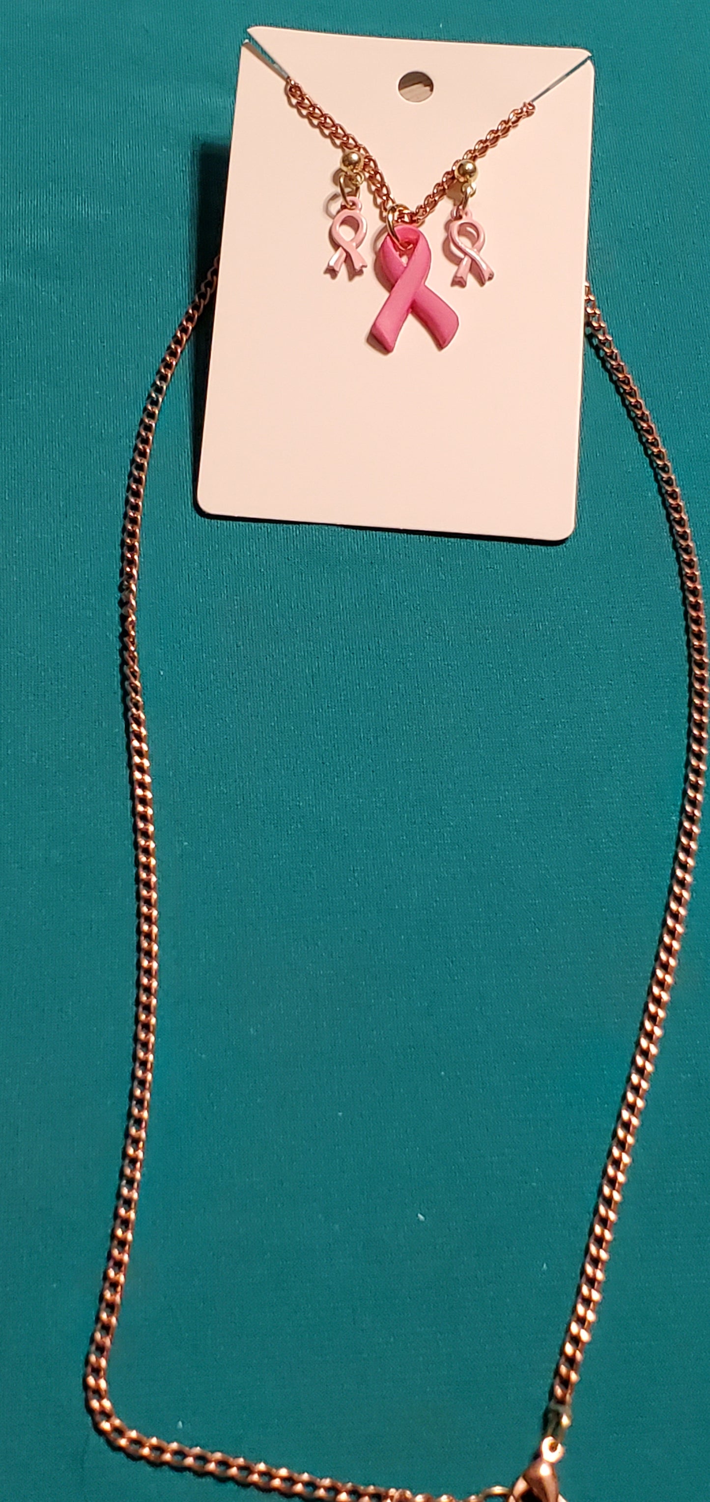 Pink cancer free gold plated necklace and earrings