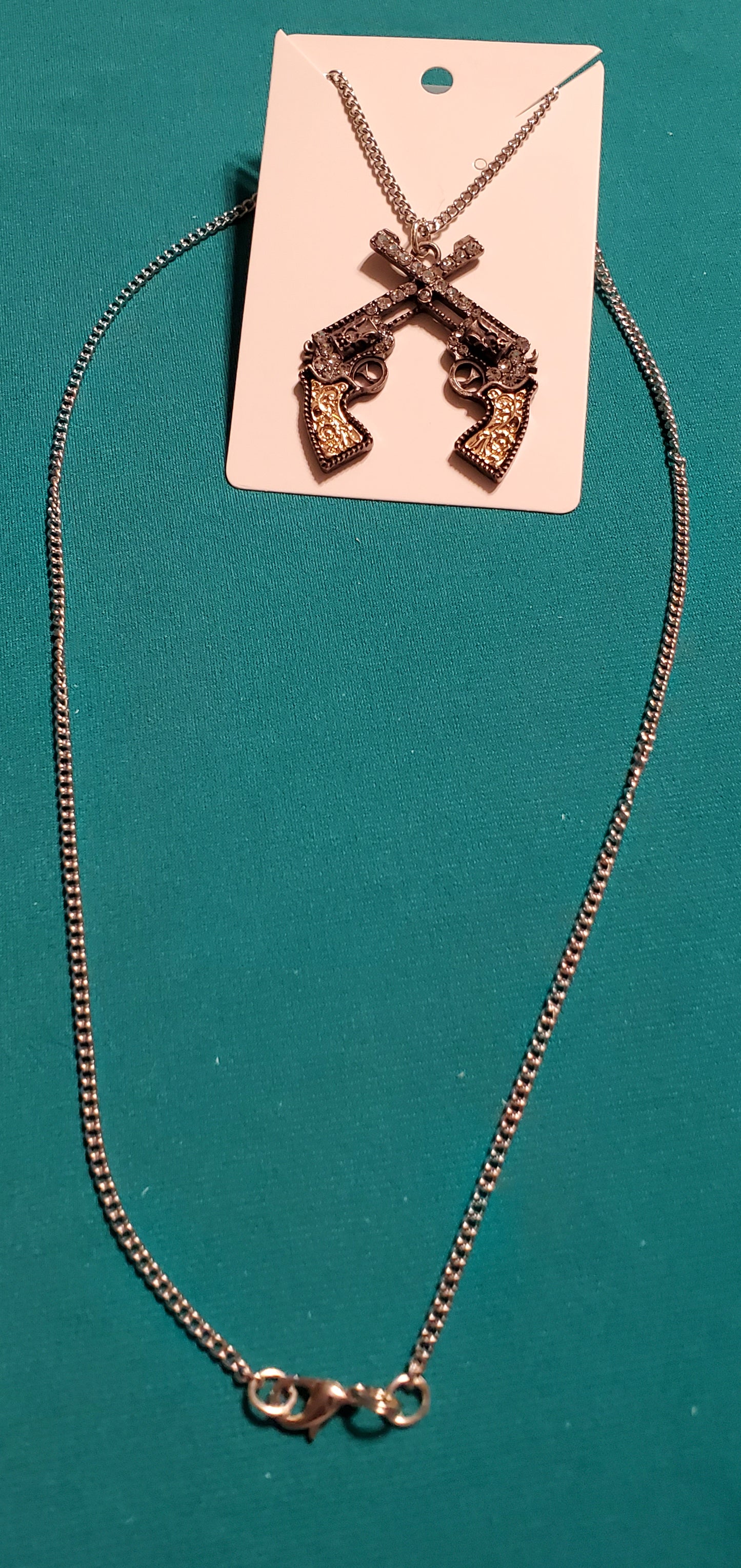 Cowgirl's guns bronze plated necklace