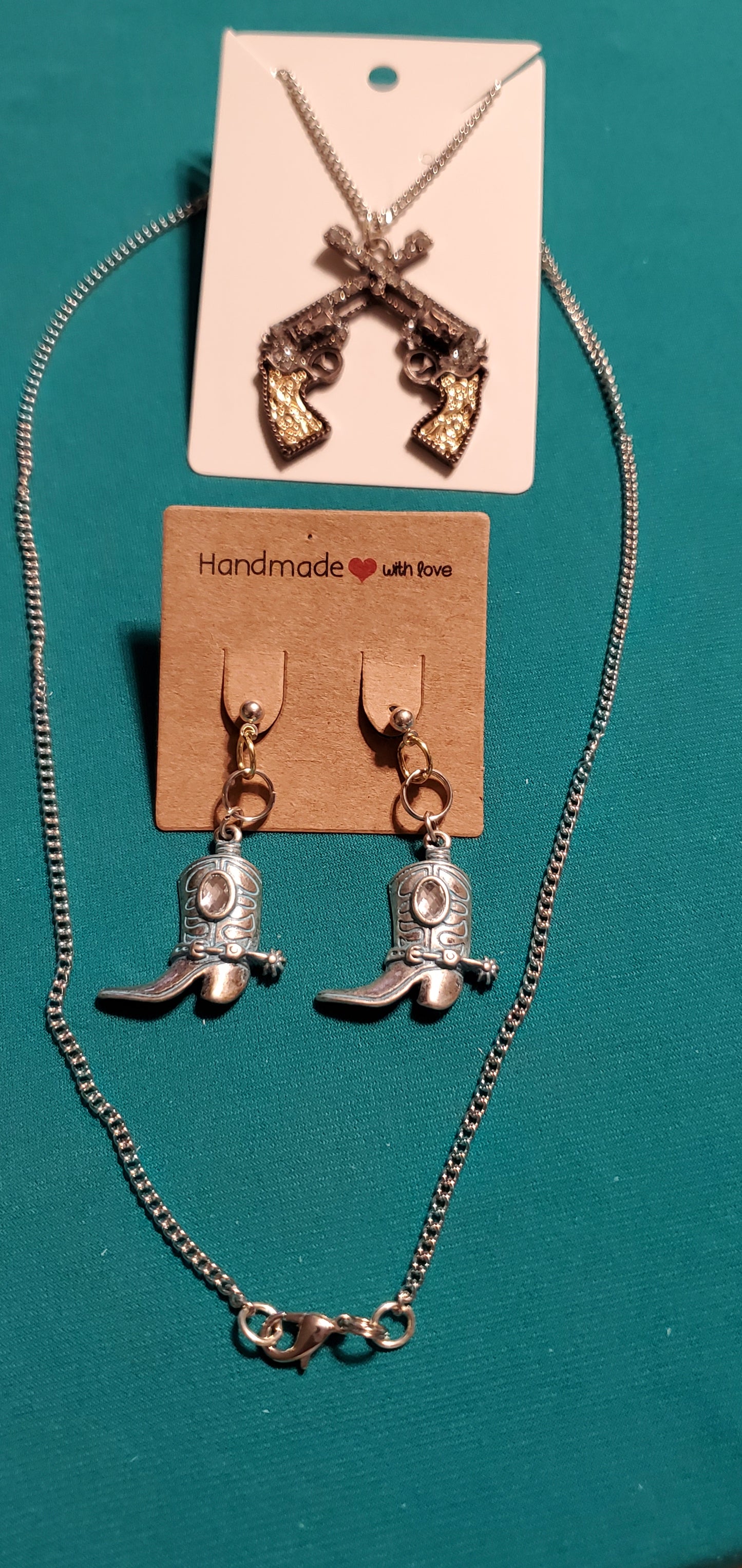 Cowgirl's guns bronze plated necklace