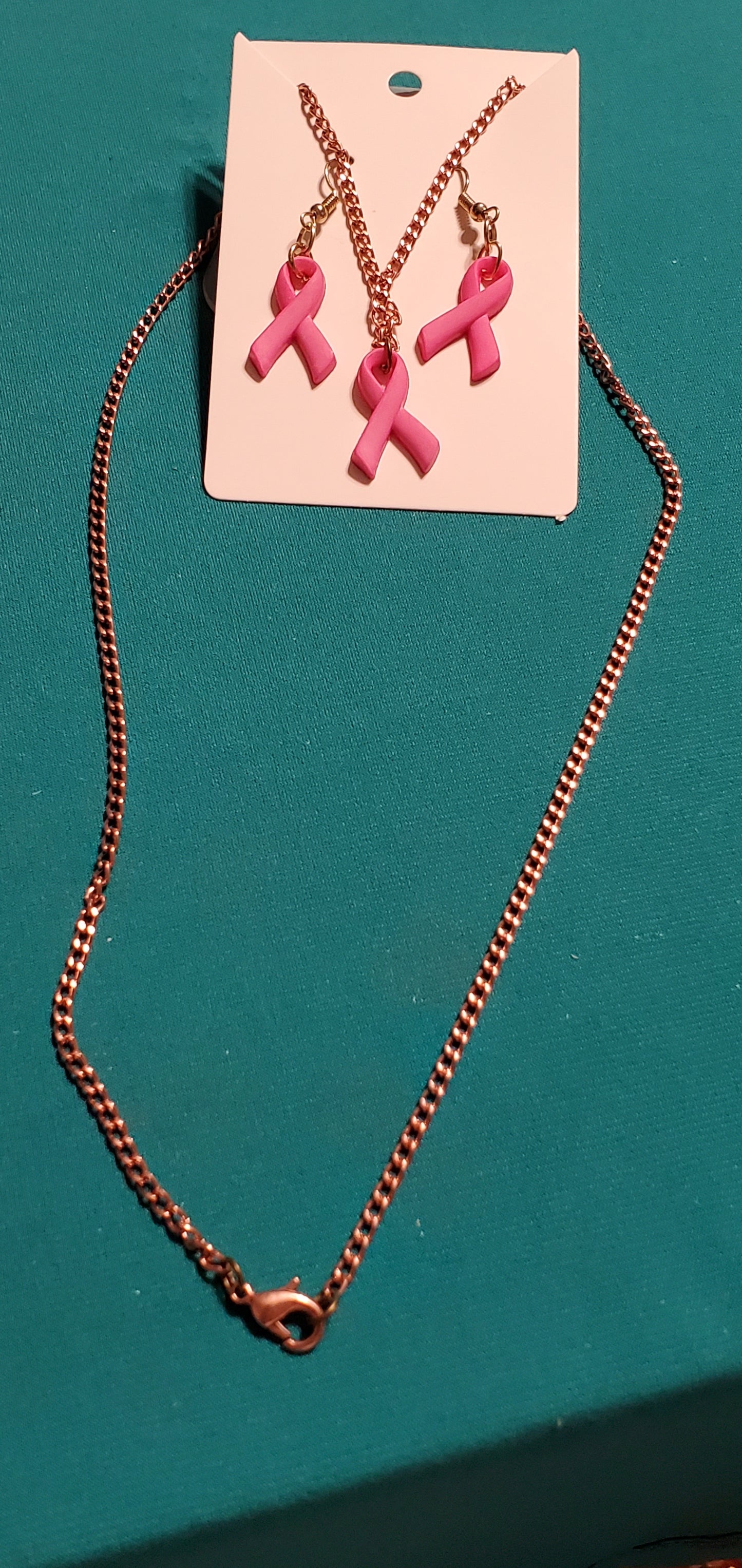 Pink cancer free gold plated necklace and earrings