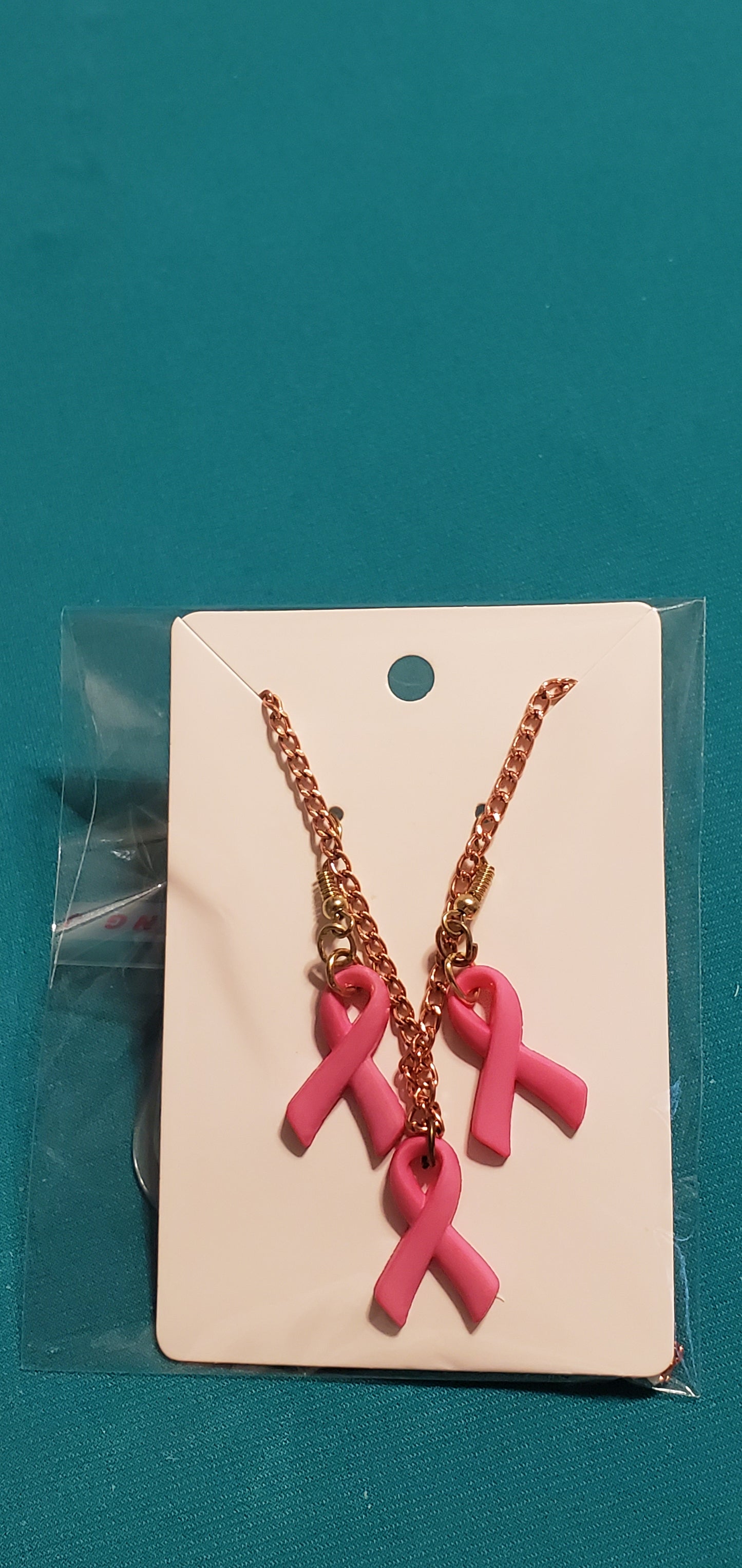 Pink cancer free gold plated necklace and earrings