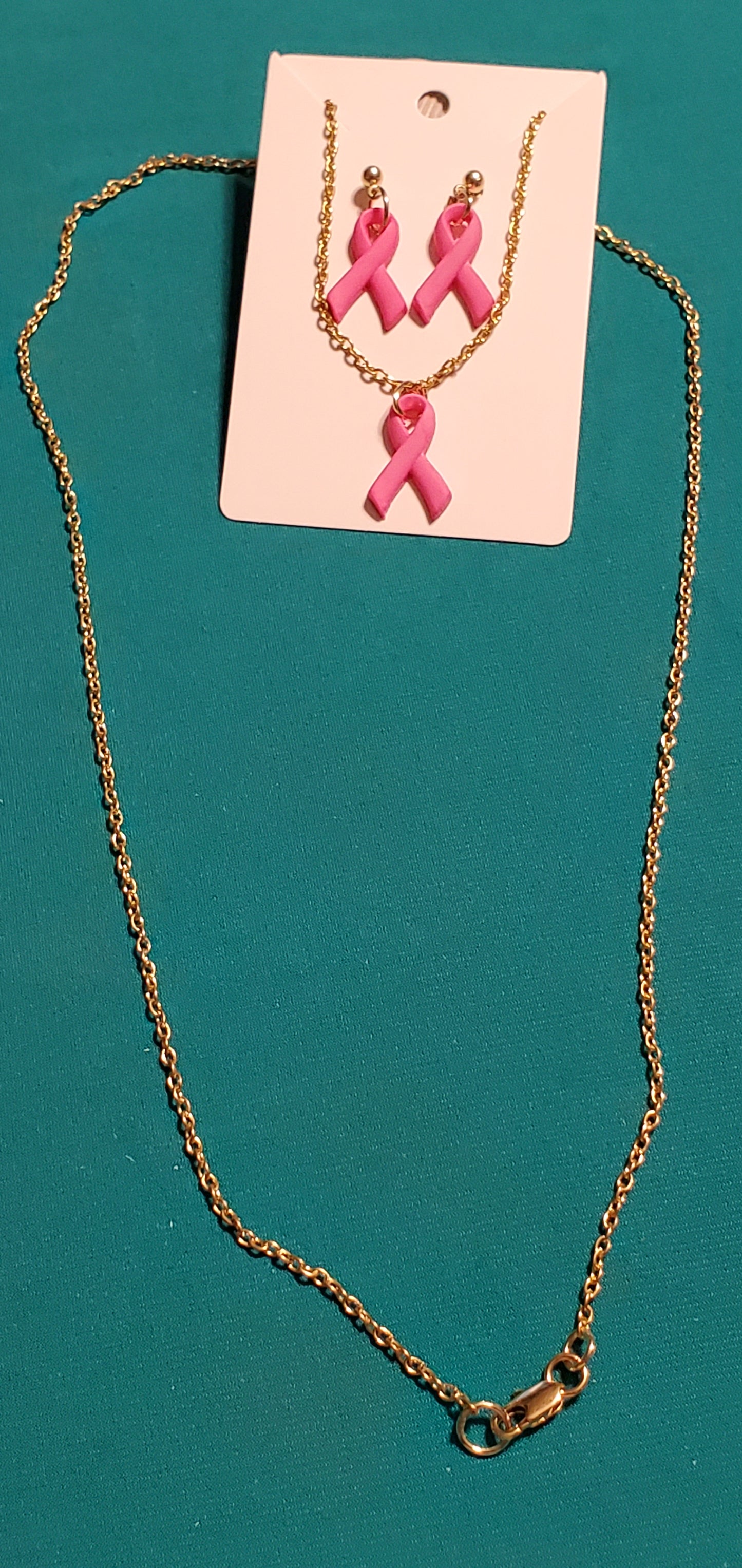Pink cancer free gold plated necklace and earrings