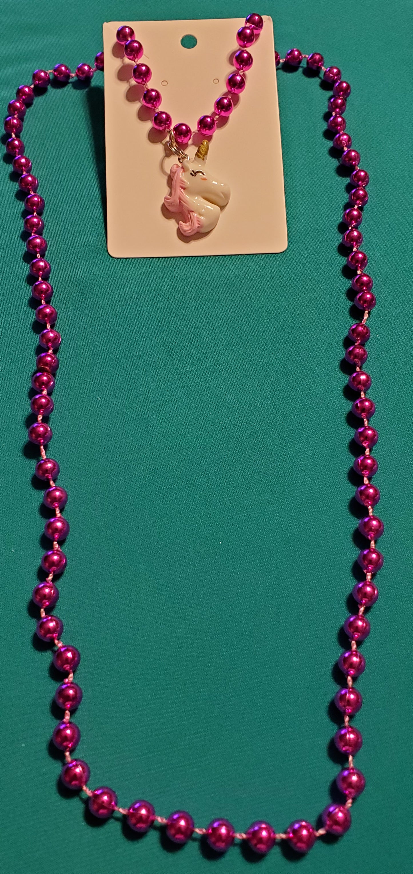 Pink & White unicorn on a pink beaded necklace and earrings