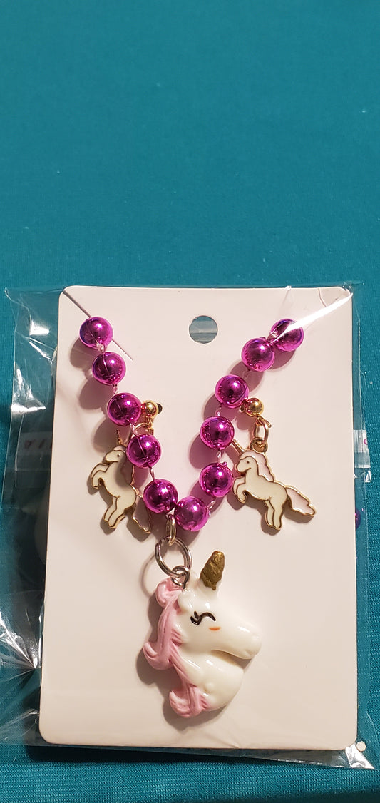 Pink and white unicorn on pink beaded necklace