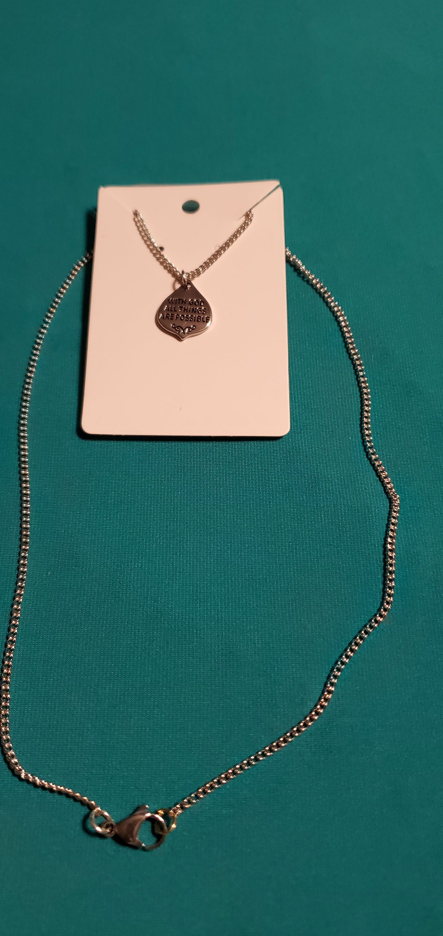 With god all things are possible on silver plated chain and angel wings earrings
