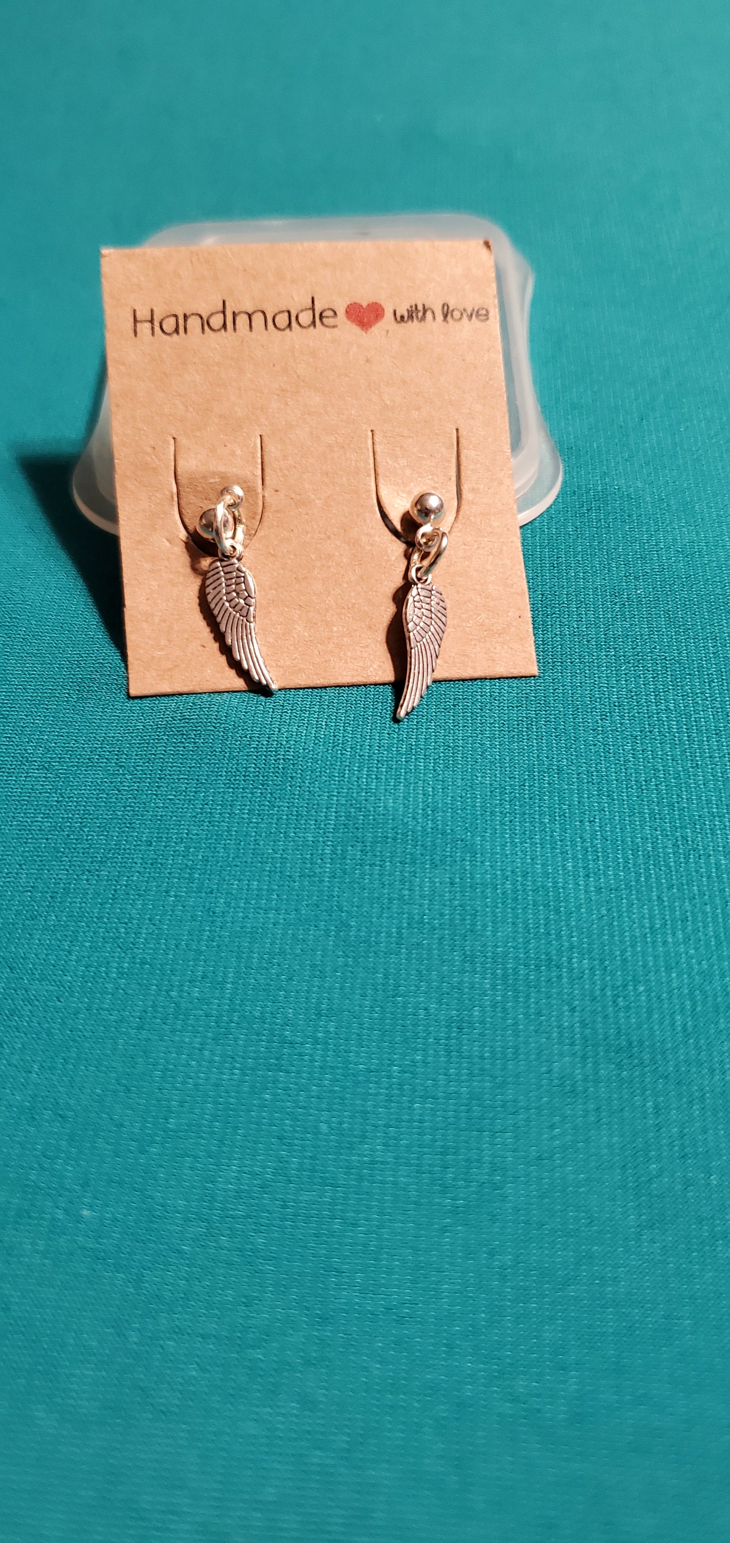 With god all things are possible on silver plated chain and angel wings earrings